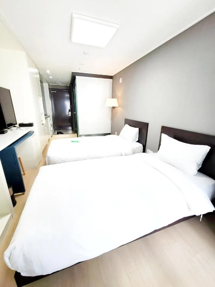 Bed in Risen Ocean Park Hotel