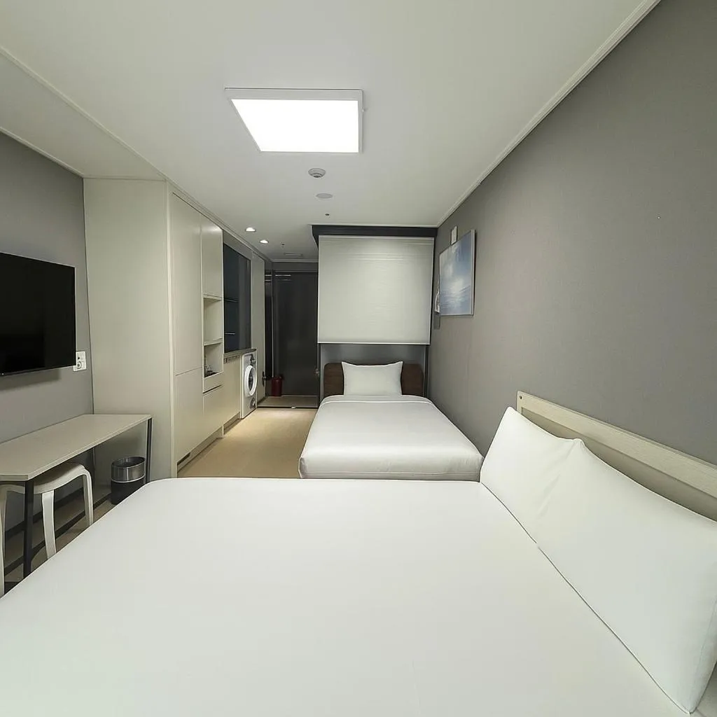 Bed in Risen Ocean Park Hotel