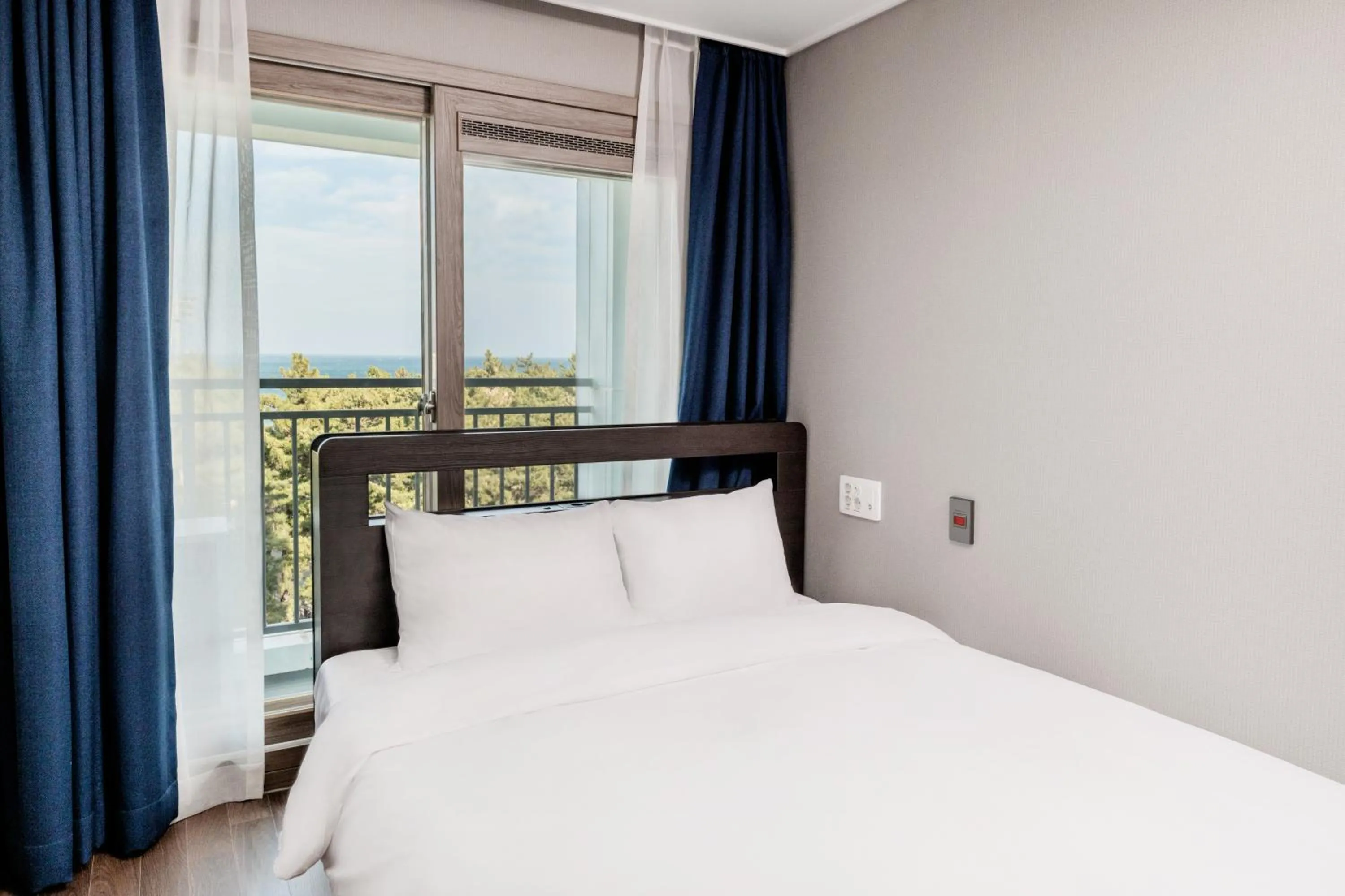 Bed in Risen Ocean Park Hotel