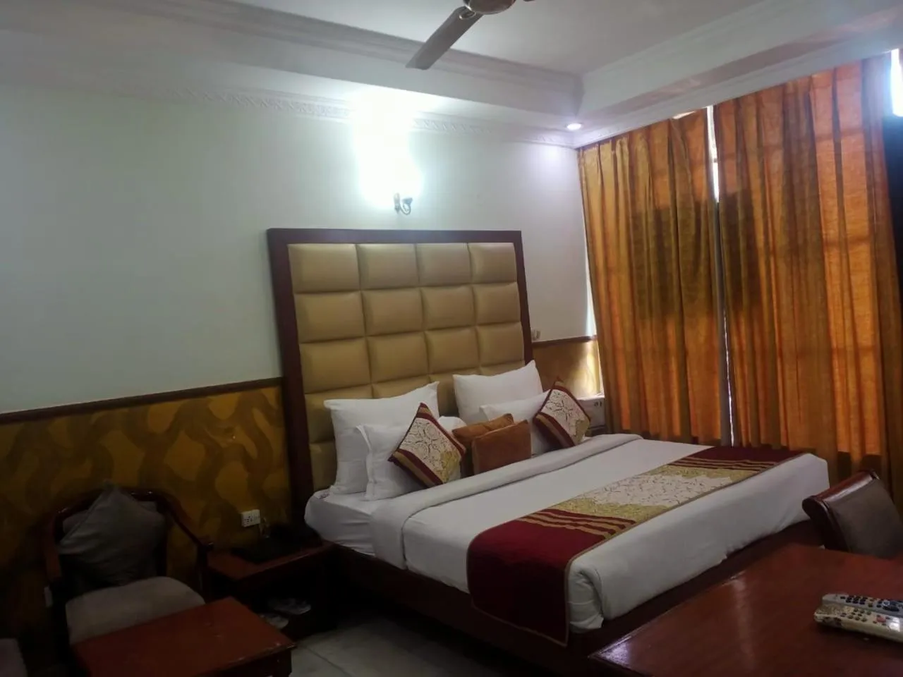 Bed in HOTEL CORPORATE INN