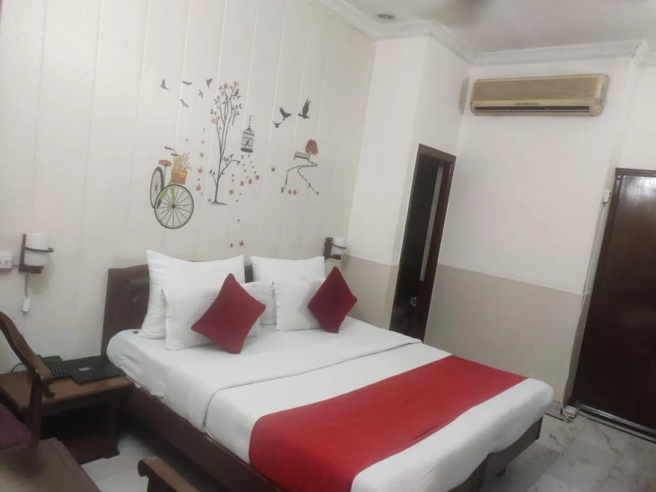 Bed in HOTEL CORPORATE INN