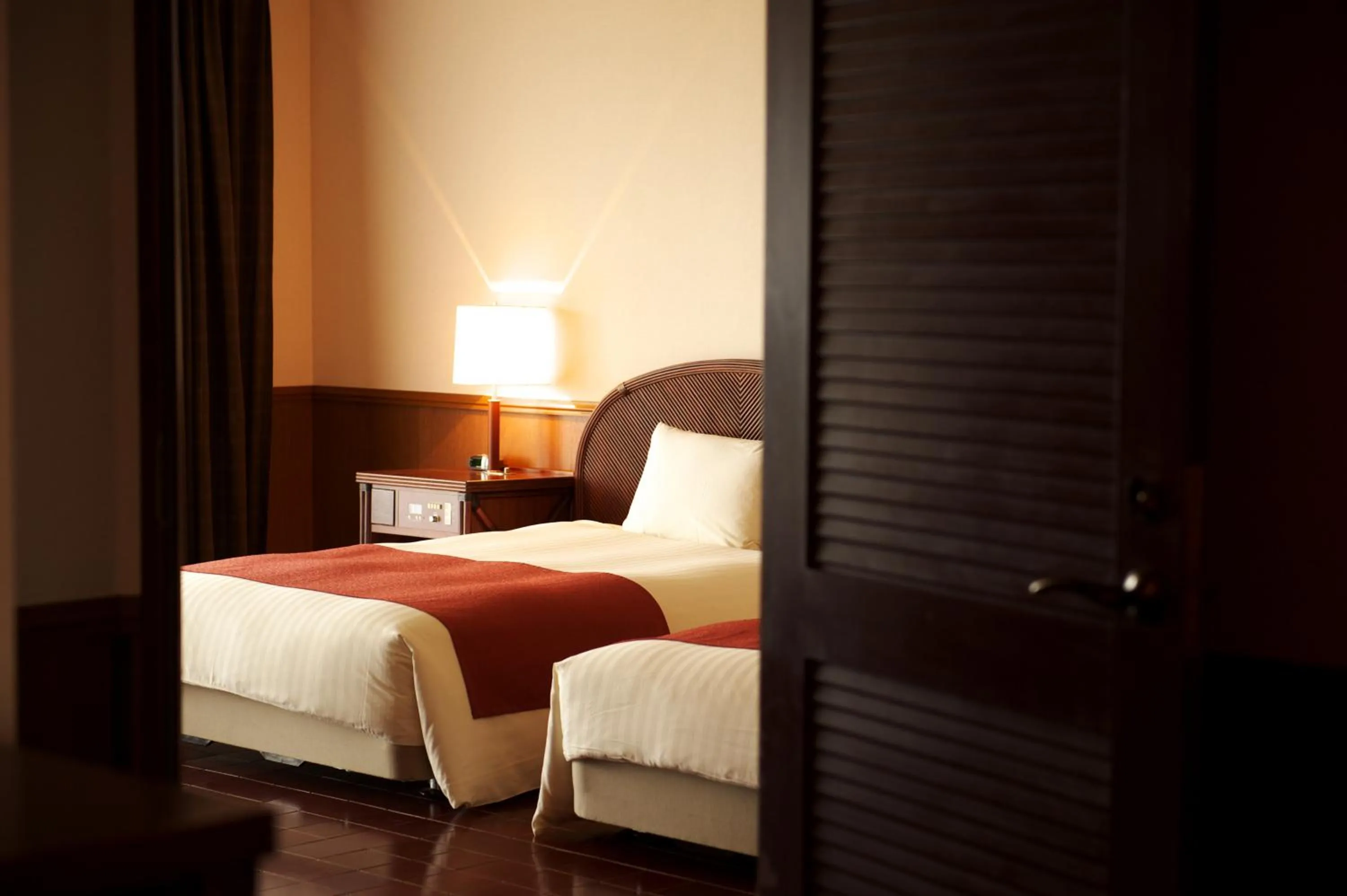 Photo of the whole room, Bed in EXES Ishigaki