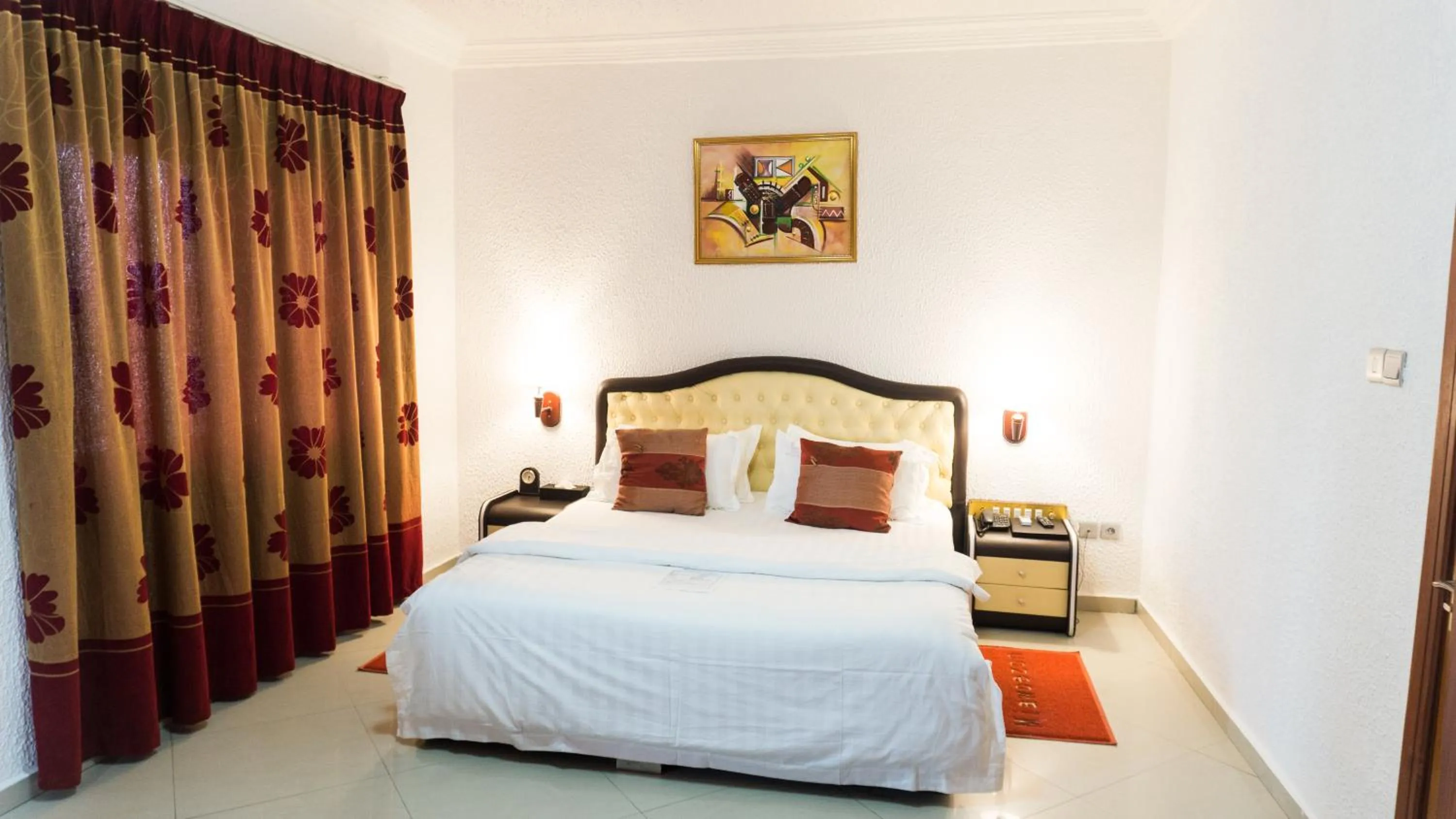 Bed in Millenium Popo Beach Hotel