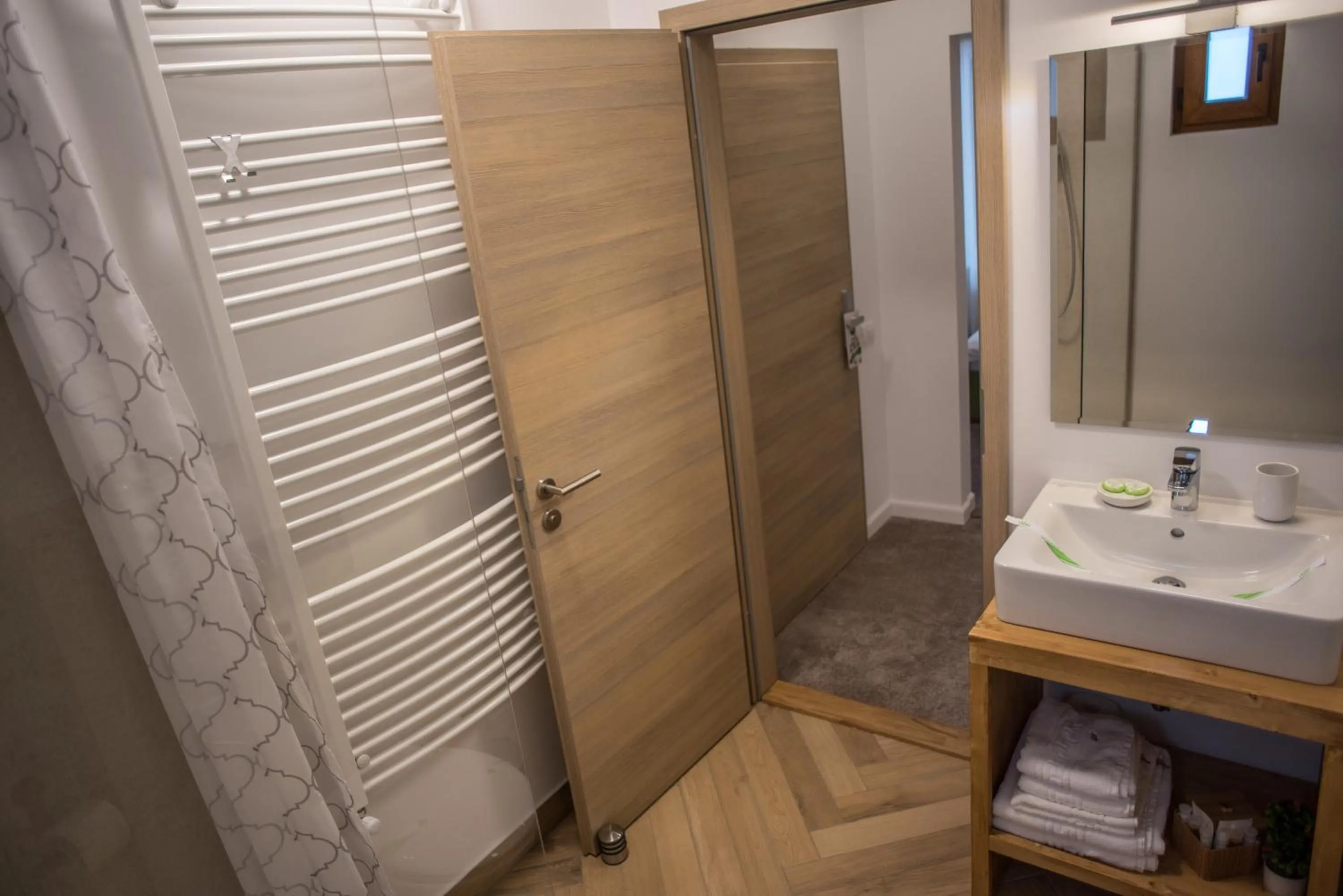 Toilet in Boga Rooms