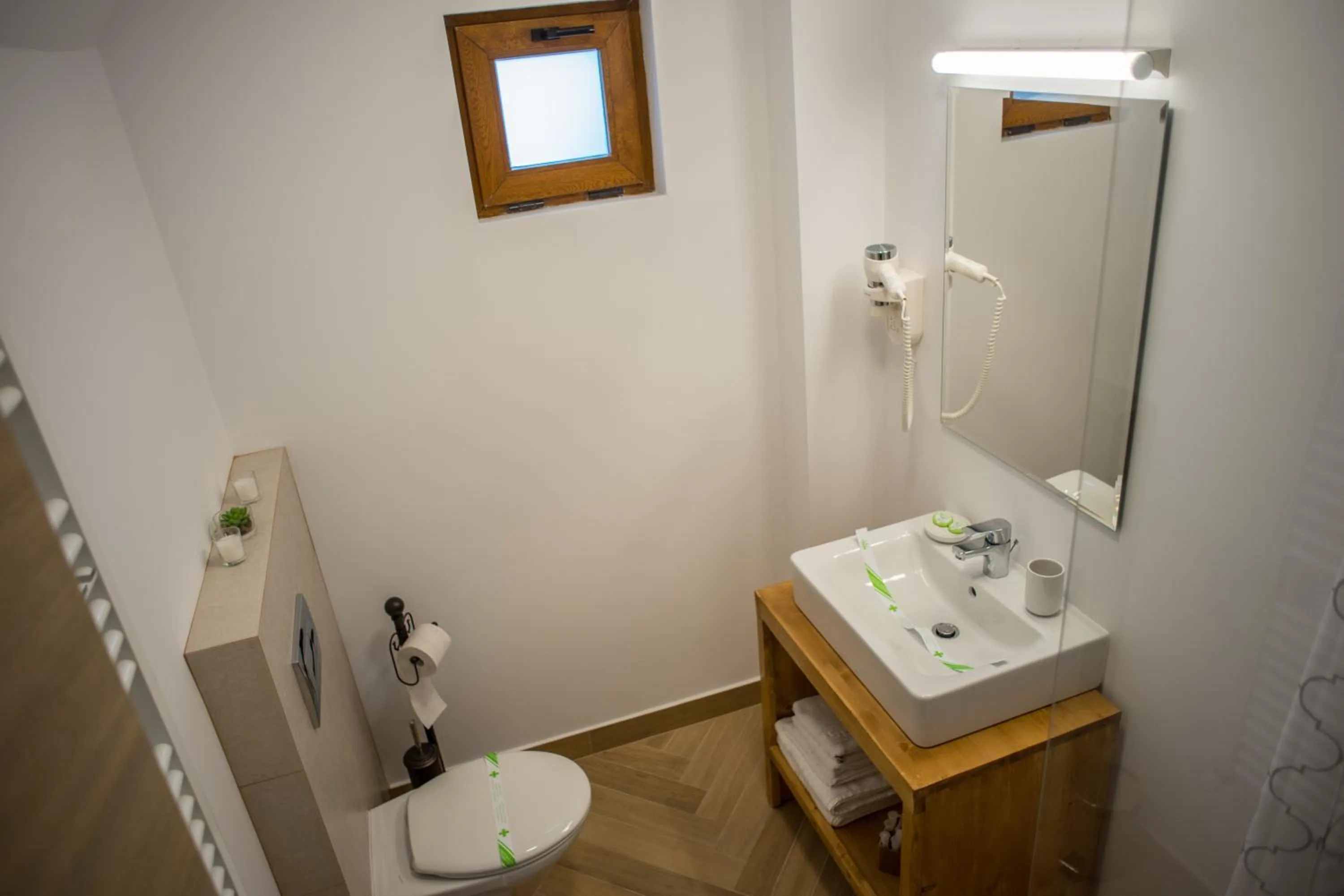 Toilet in Boga Rooms