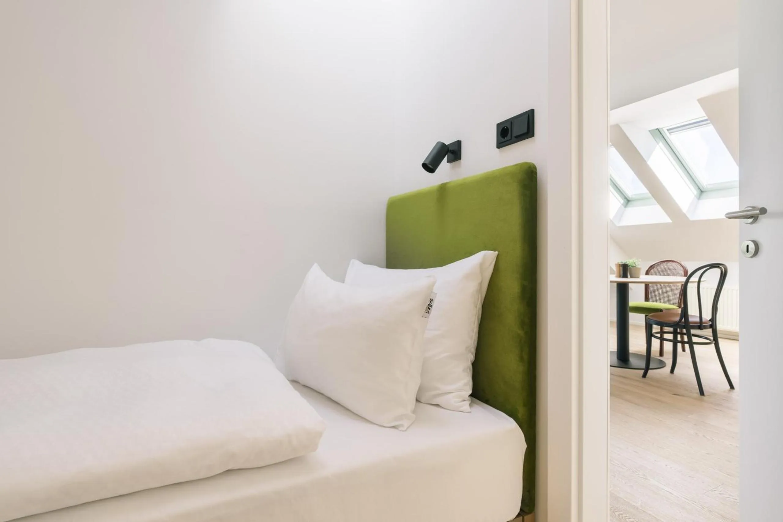 Bed in Bio-Hotel Schani Wienblick