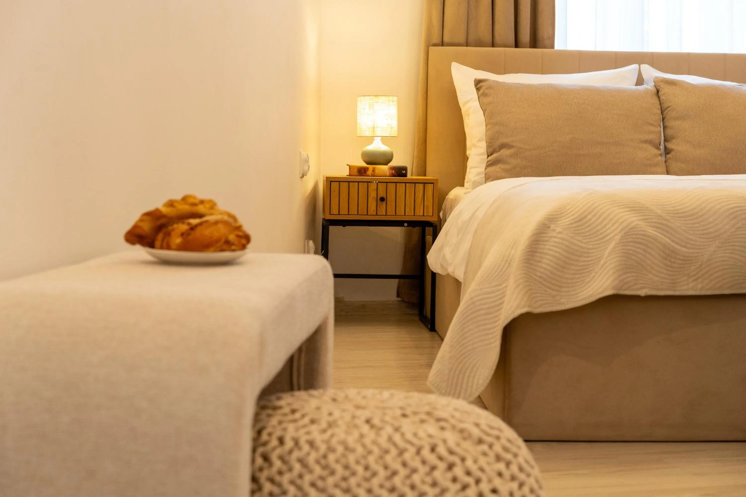 Decorative detail, Bed in Kazimierz Residence Apartments by Staymoovers