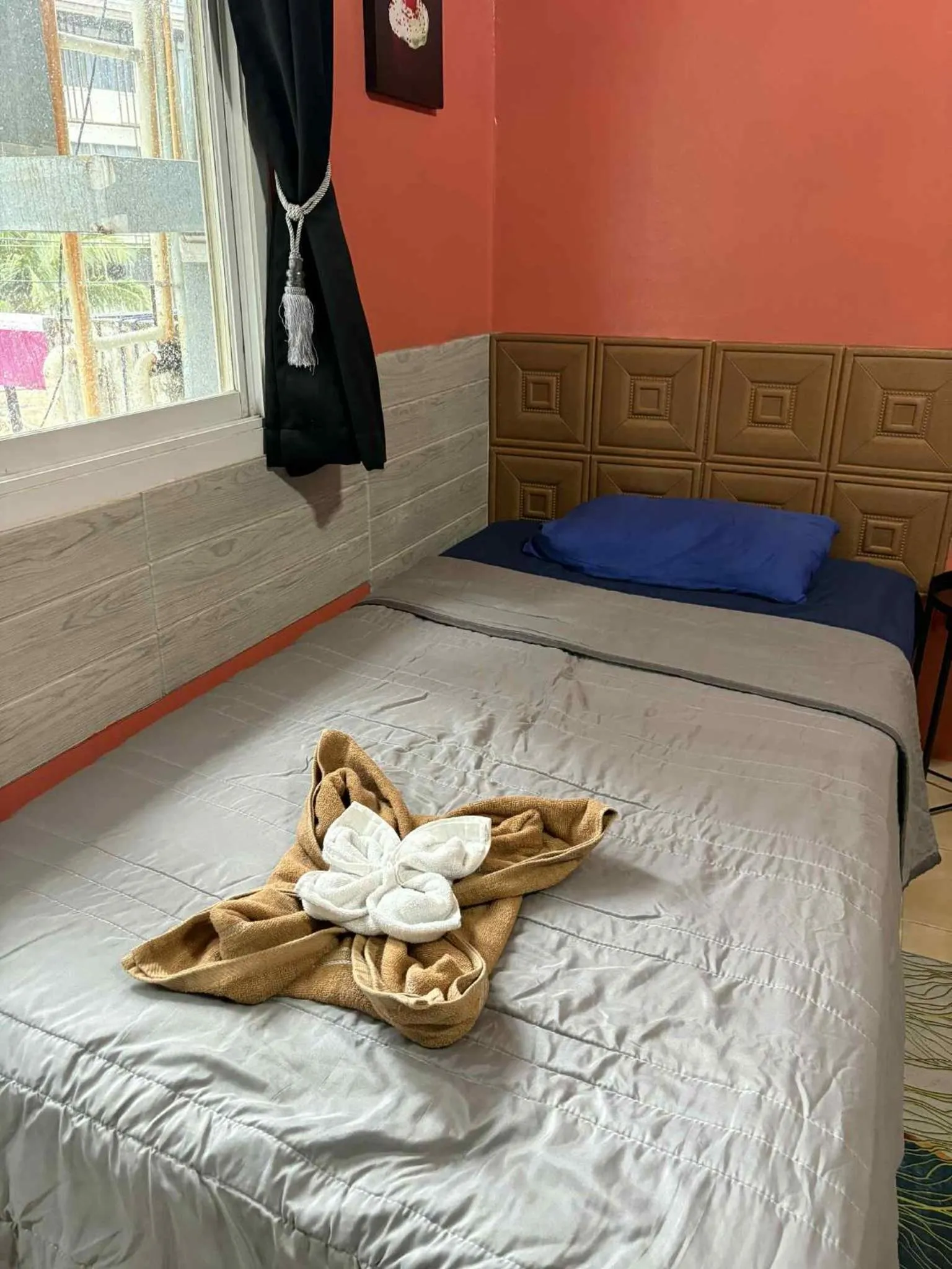 Bed in San Antonio Beach Guesthouse & Restaurant