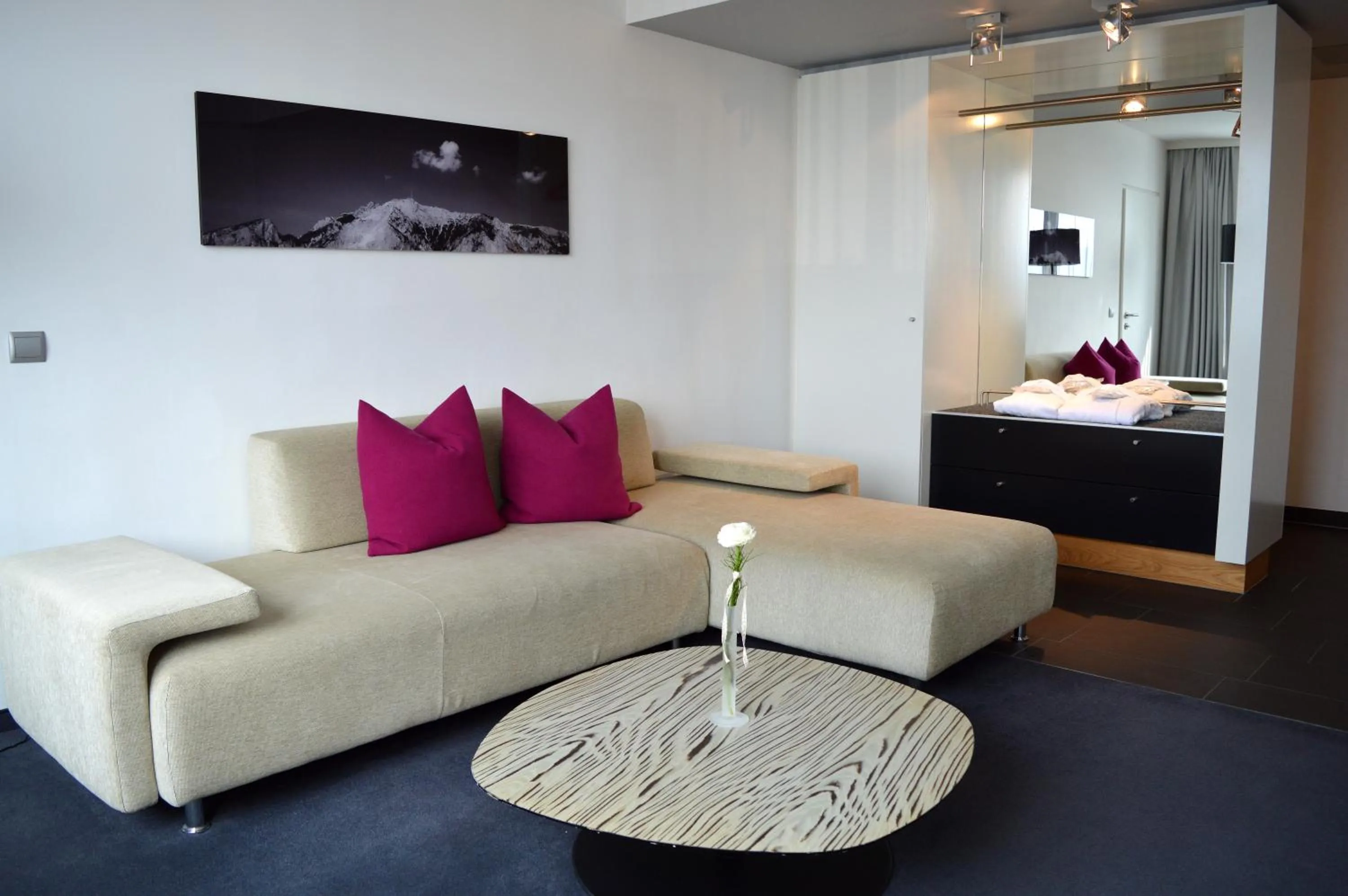 Living room in voco Villach by IHG