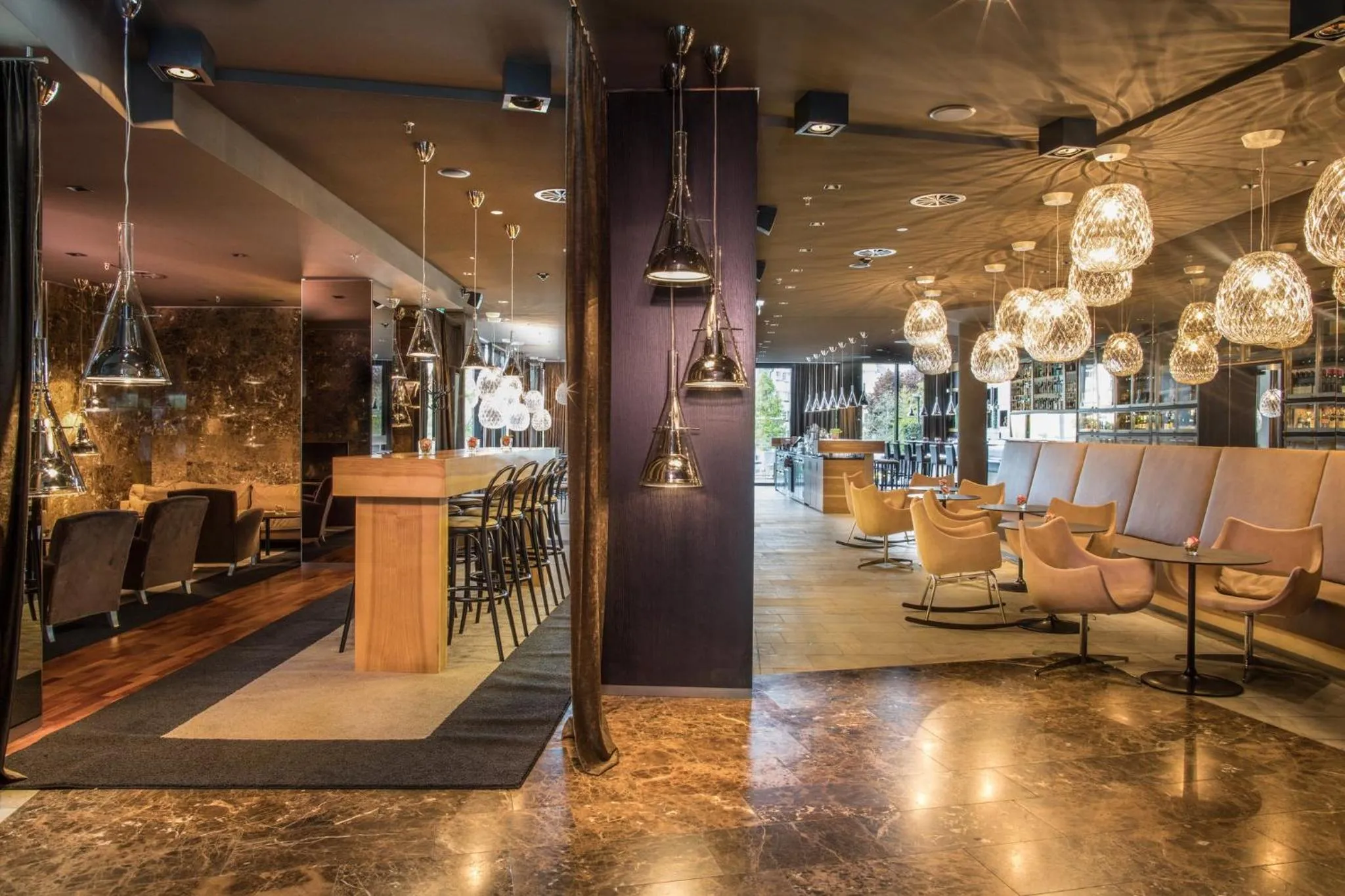 Lounge or bar in voco Villach by IHG