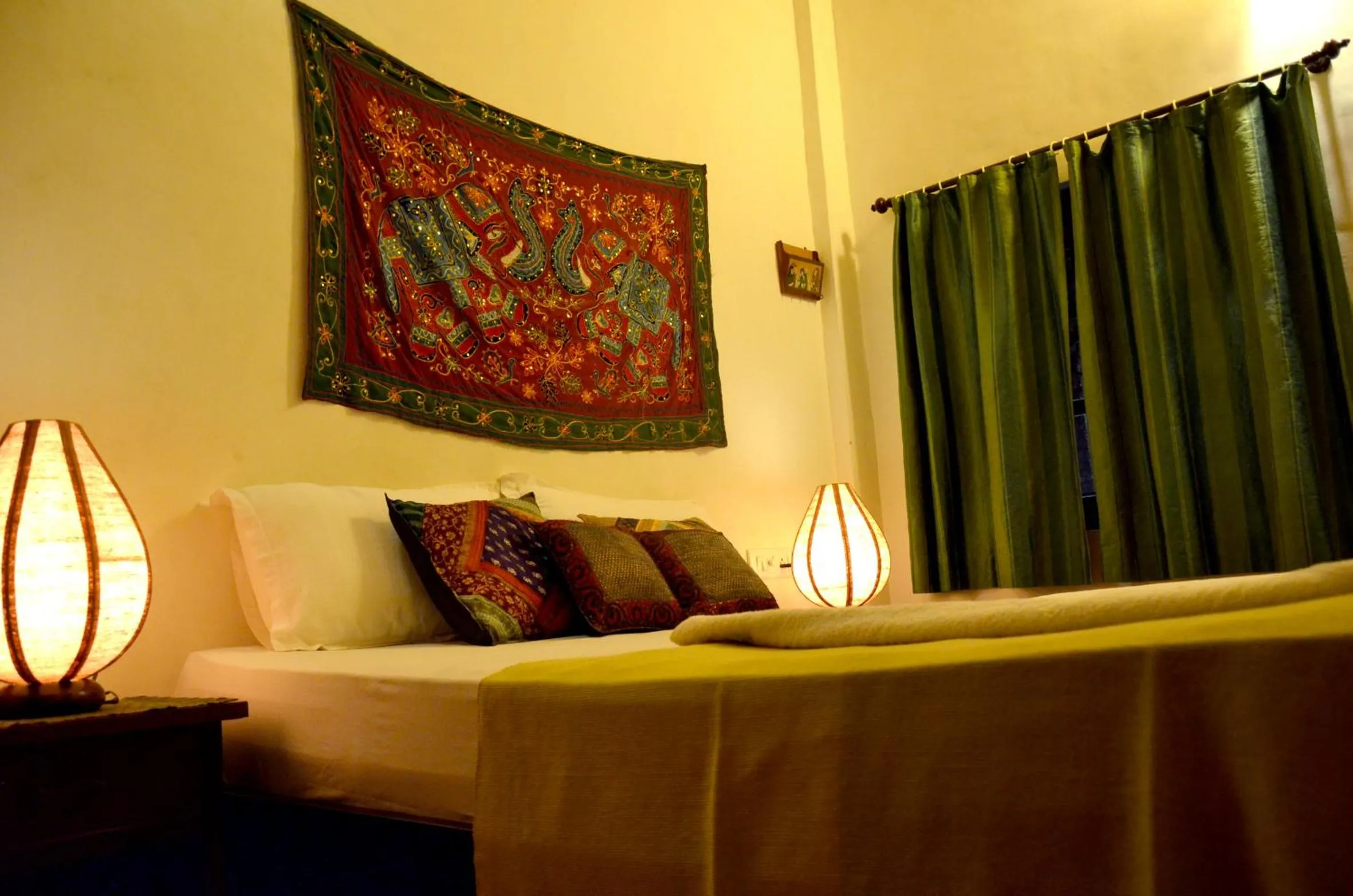 Bed in Little India Beach Cottages