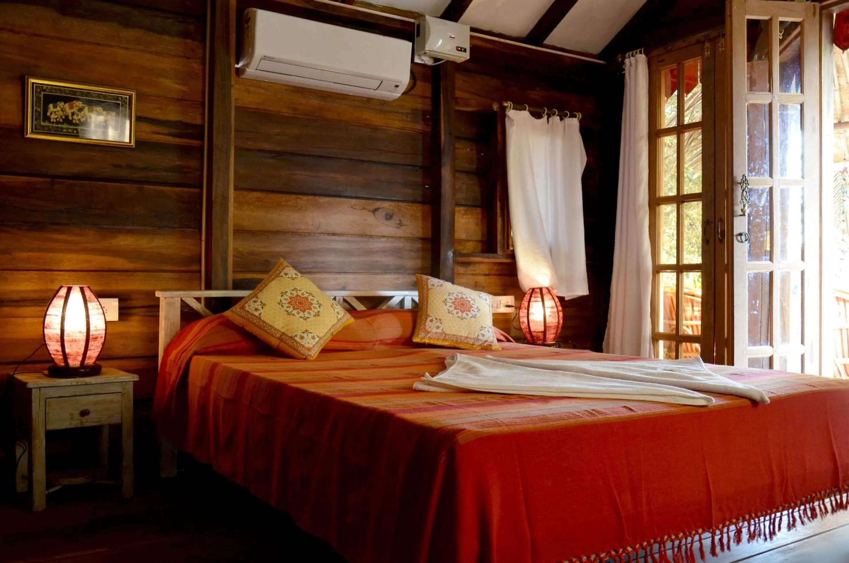 Bed in Little India Beach Cottages