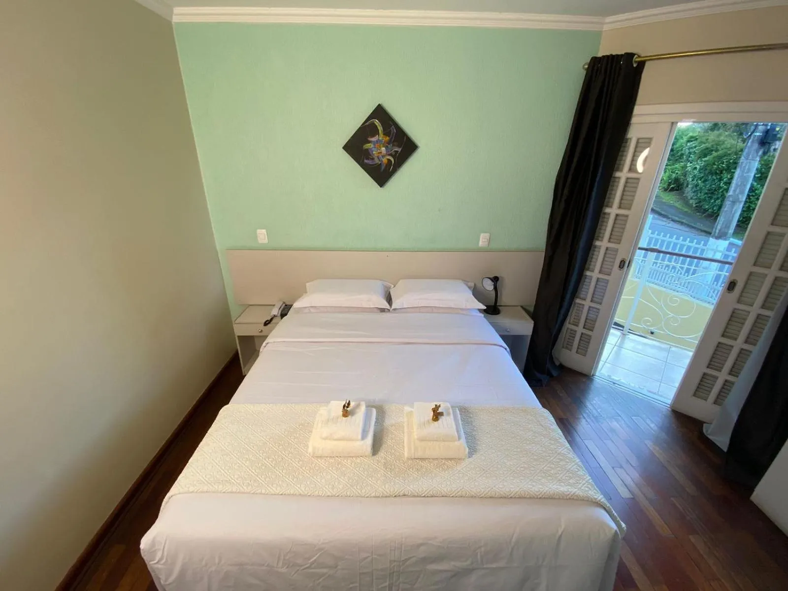 Bed in Pousada Jordão