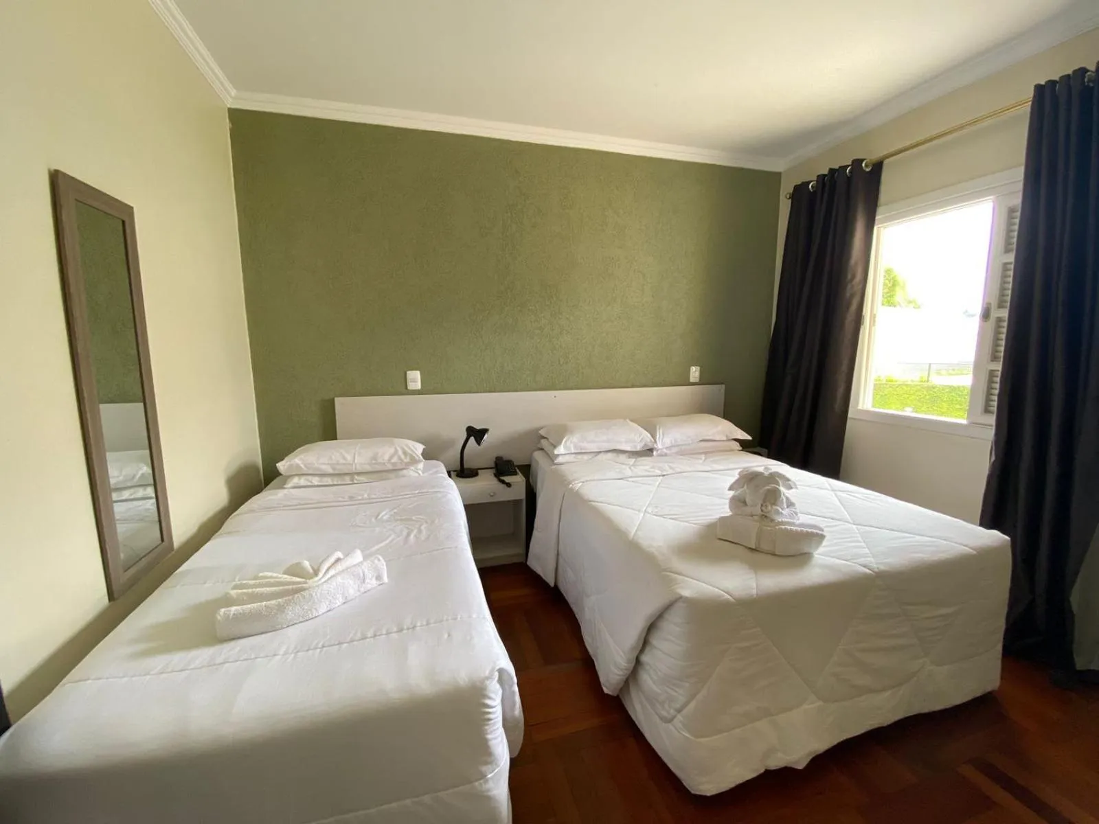 Bed in Pousada Jordão