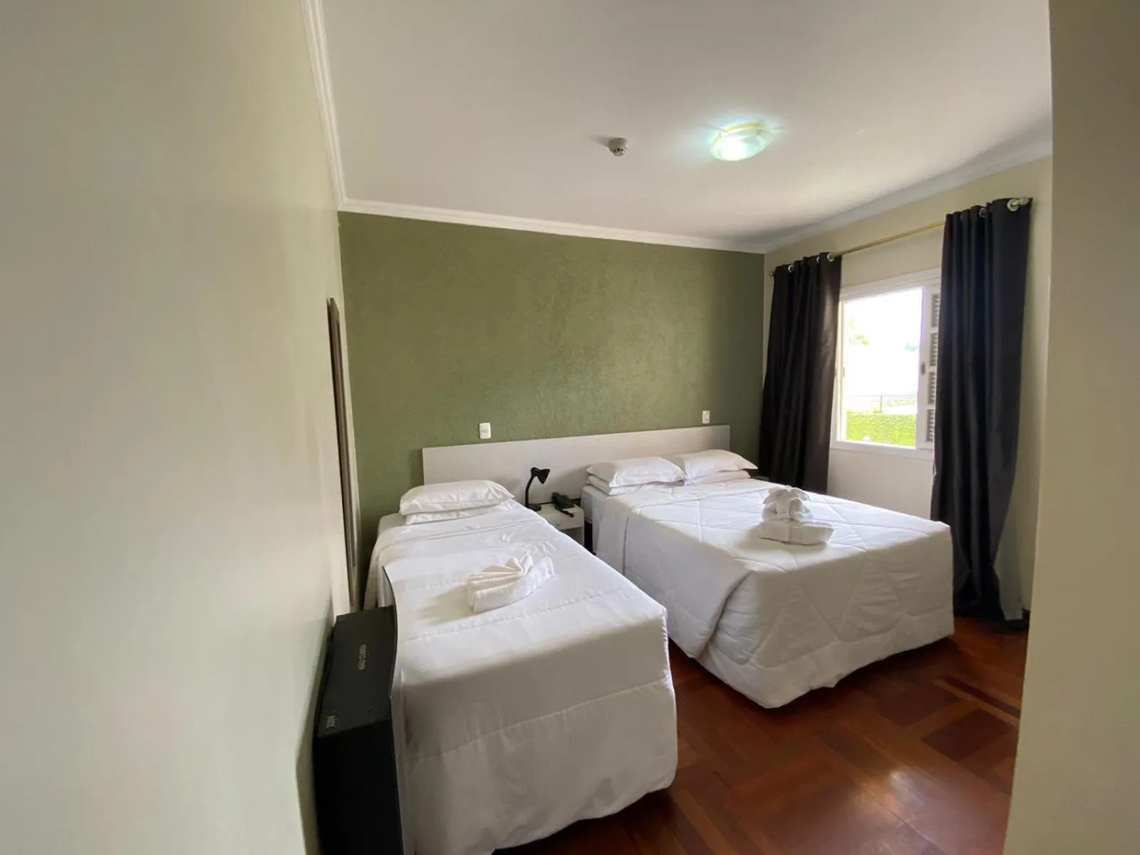 Bed in Pousada Jordão