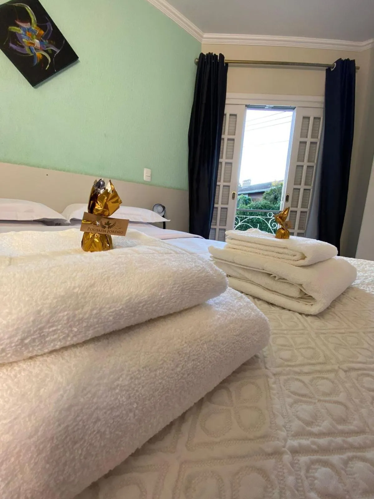 towels, Bed in Pousada Jordão