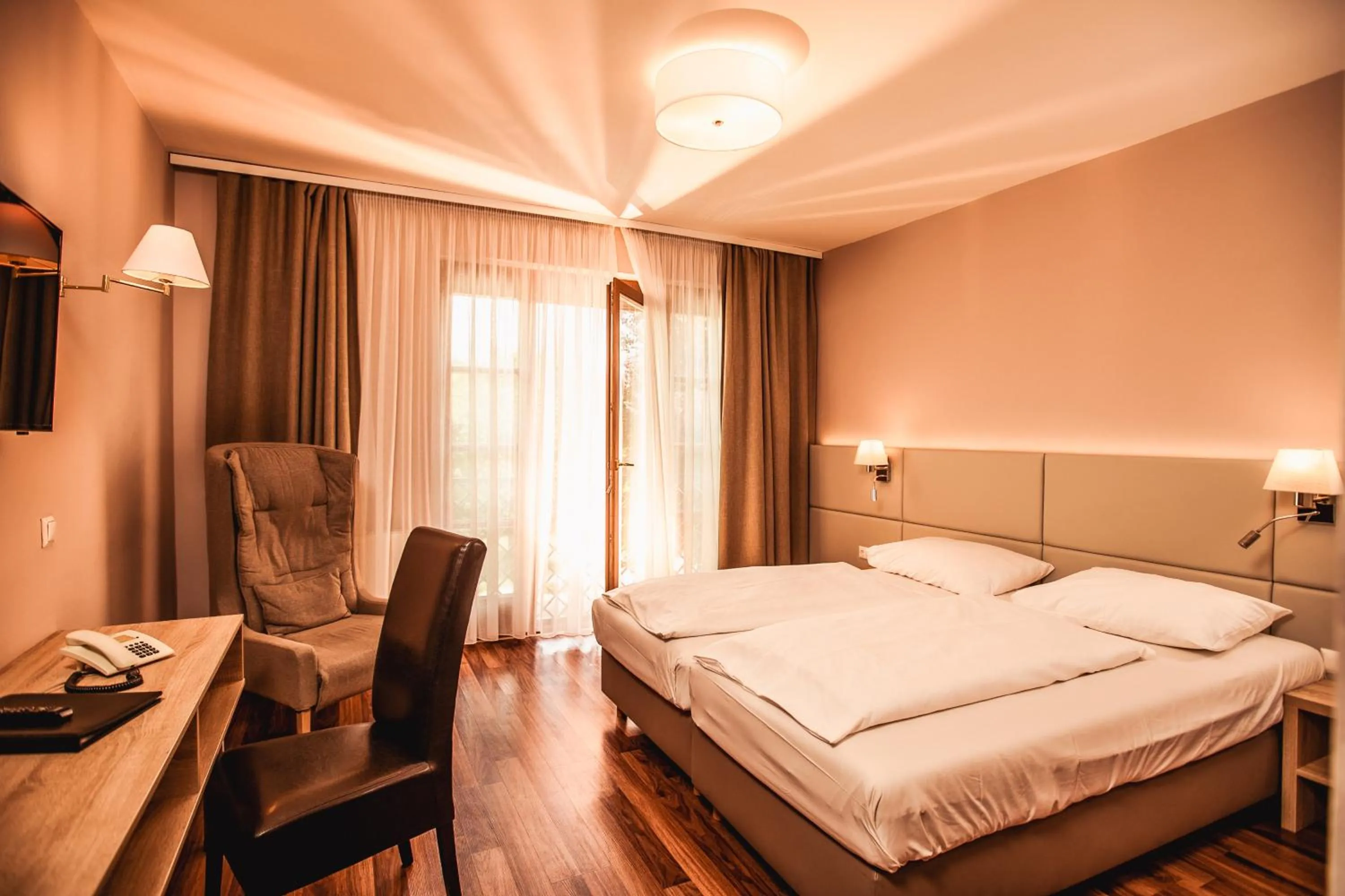 Photo of the whole room, Bed in Simon - das Vitalhotel