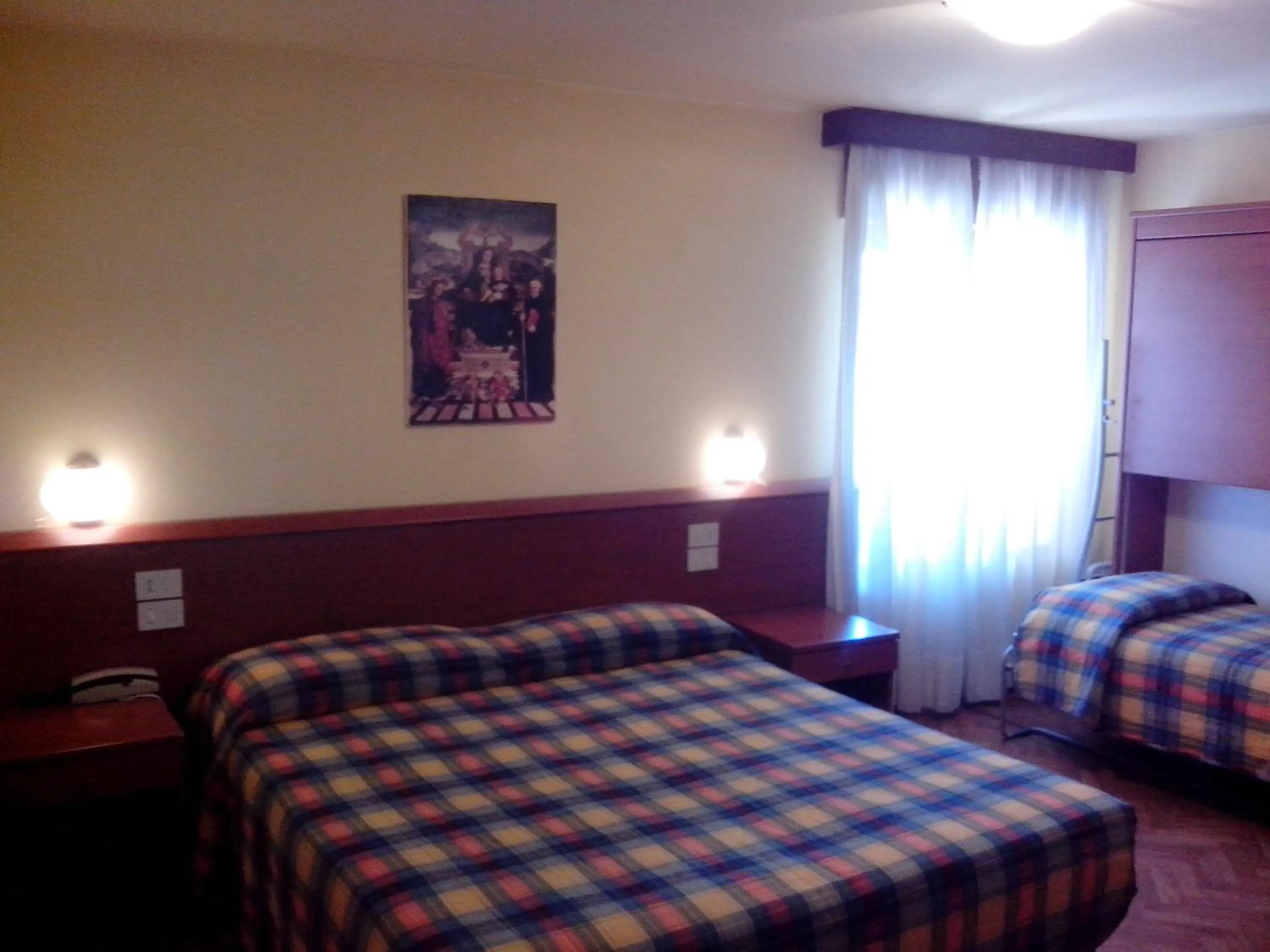 Seating area, Bed in Hotel Monte Fior