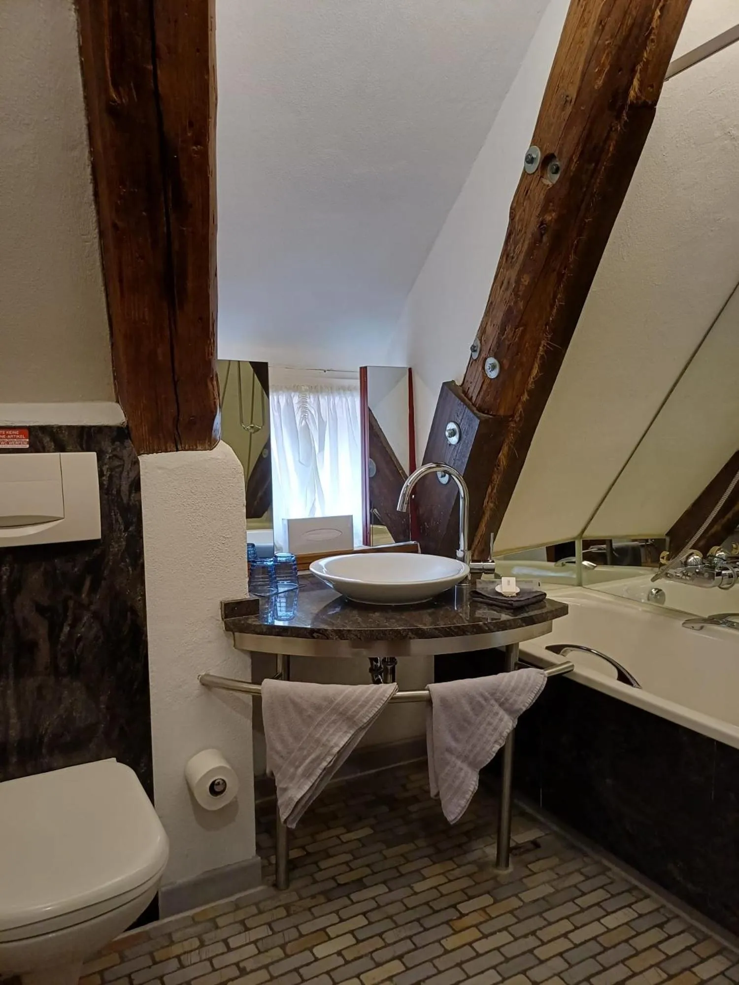 Bathroom in Schiefes Haus