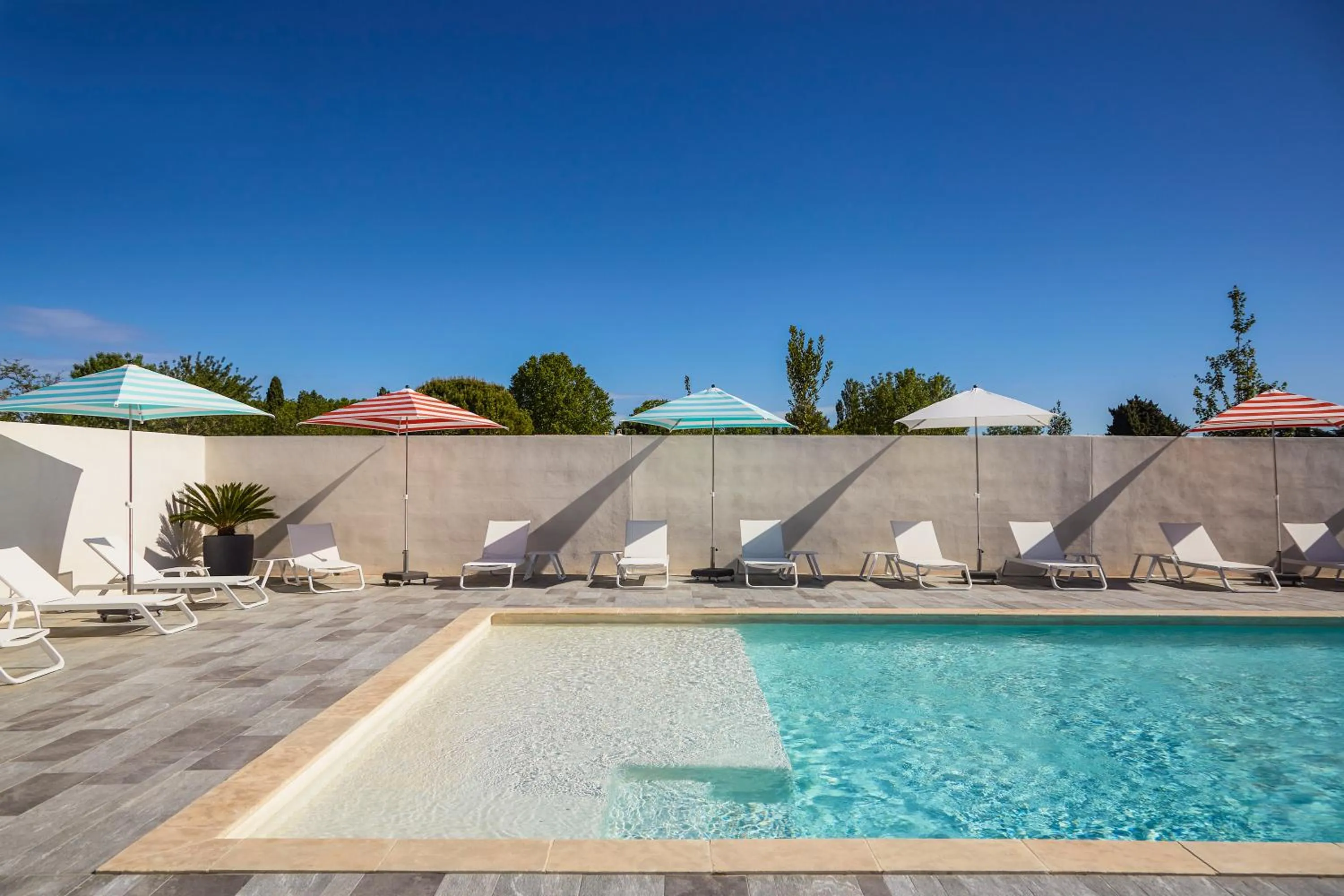 Swimming pool in Ibis Styles Montpellier Aéroport Parc Des Expos