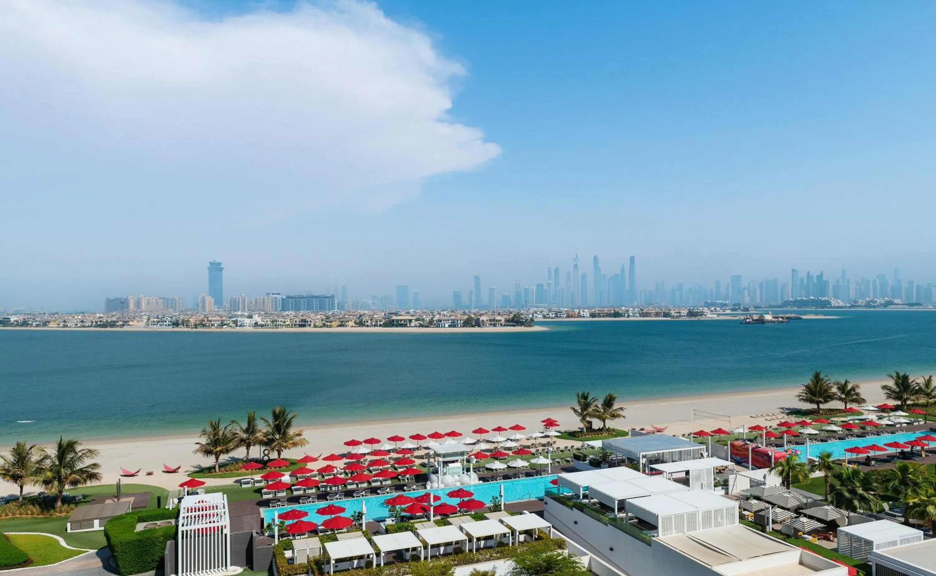 Property building in Th8 Palm Dubai Beach Resort Vignette Collection, an IHG hotel