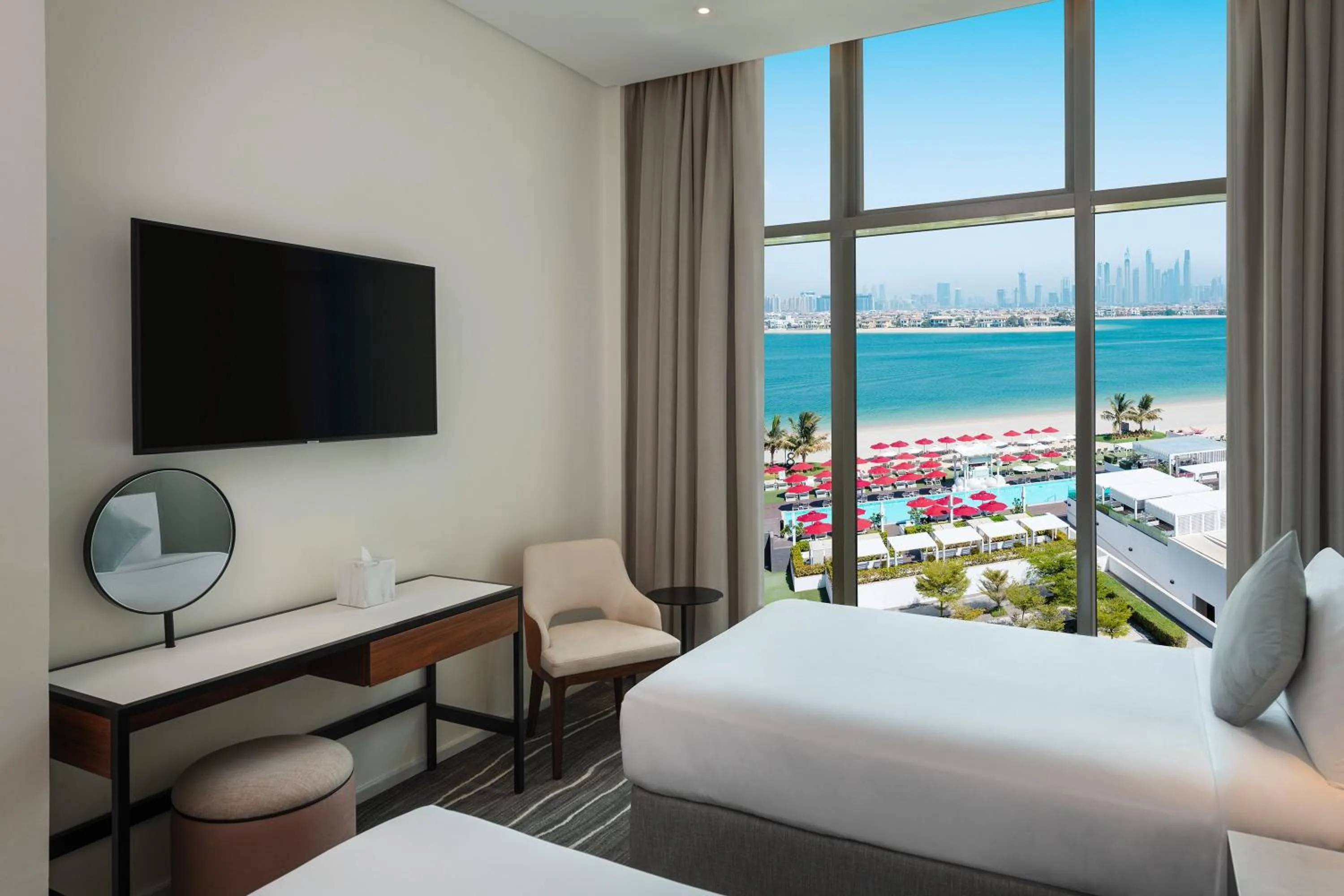 Photo of the whole room, Bed in Th8 Palm Dubai Beach Resort Vignette Collection, an IHG hotel