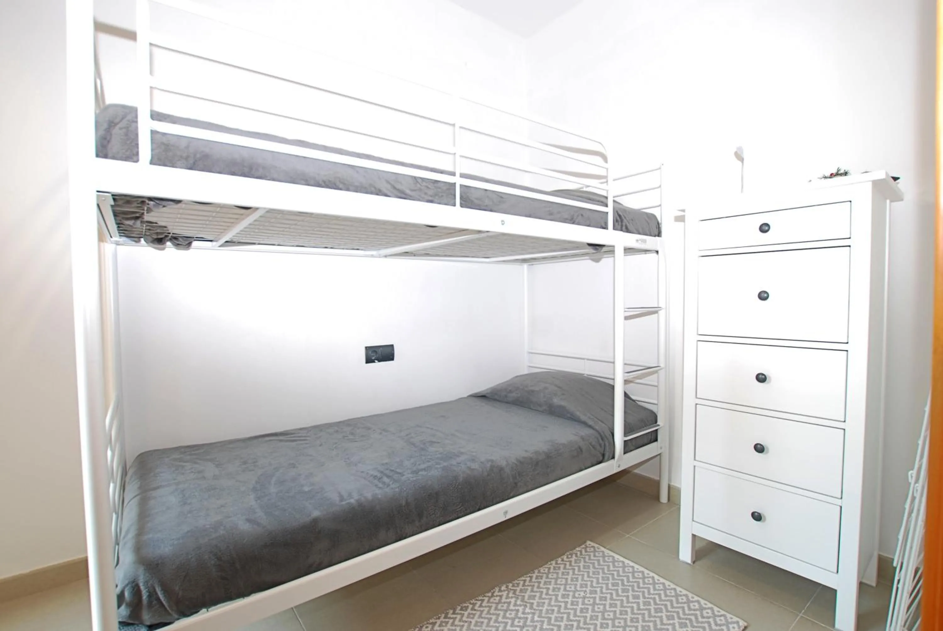 bunk bed, Bed in Petit niu · Petit niu · Apartamento AC - 3 min de la playa