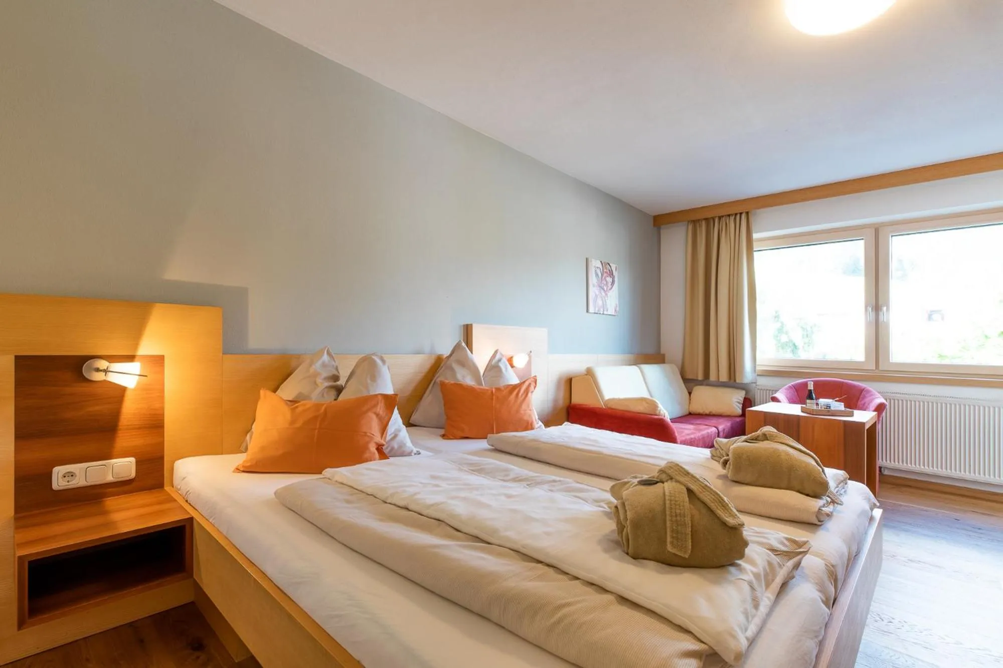 Bedroom, Bed in Hotel Salzburger Hof Leogang