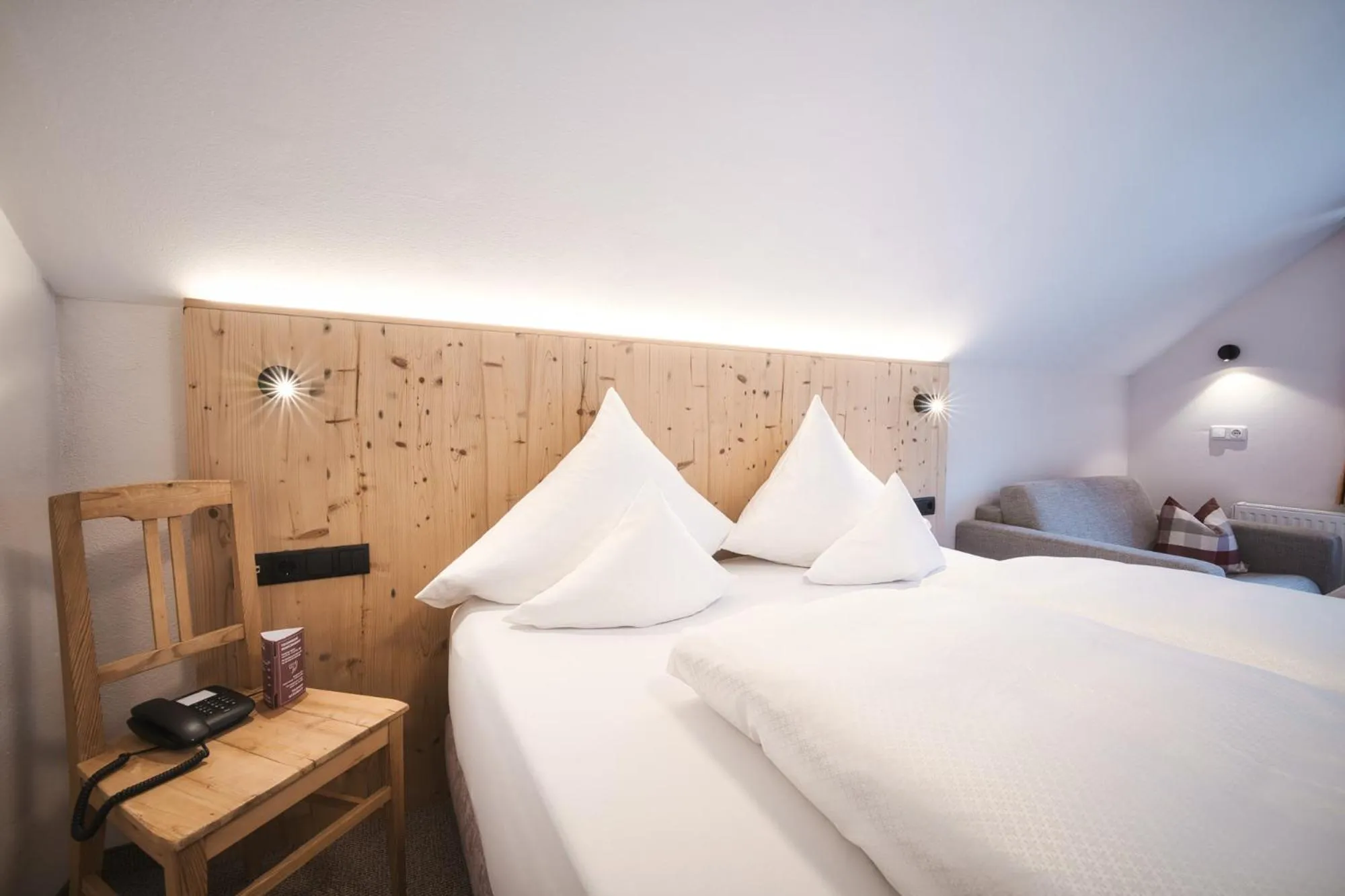 Photo of the whole room, Bed in Hotel Die Arlbergerin - Design & Tiroler Gemütlichkeit