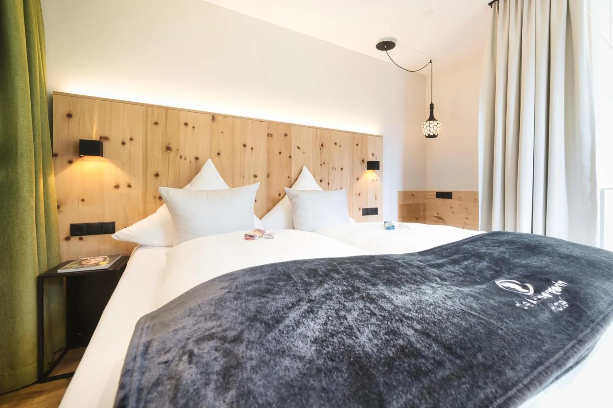 Photo of the whole room, Bed in Hotel Die Arlbergerin - Design & Tiroler Gemütlichkeit