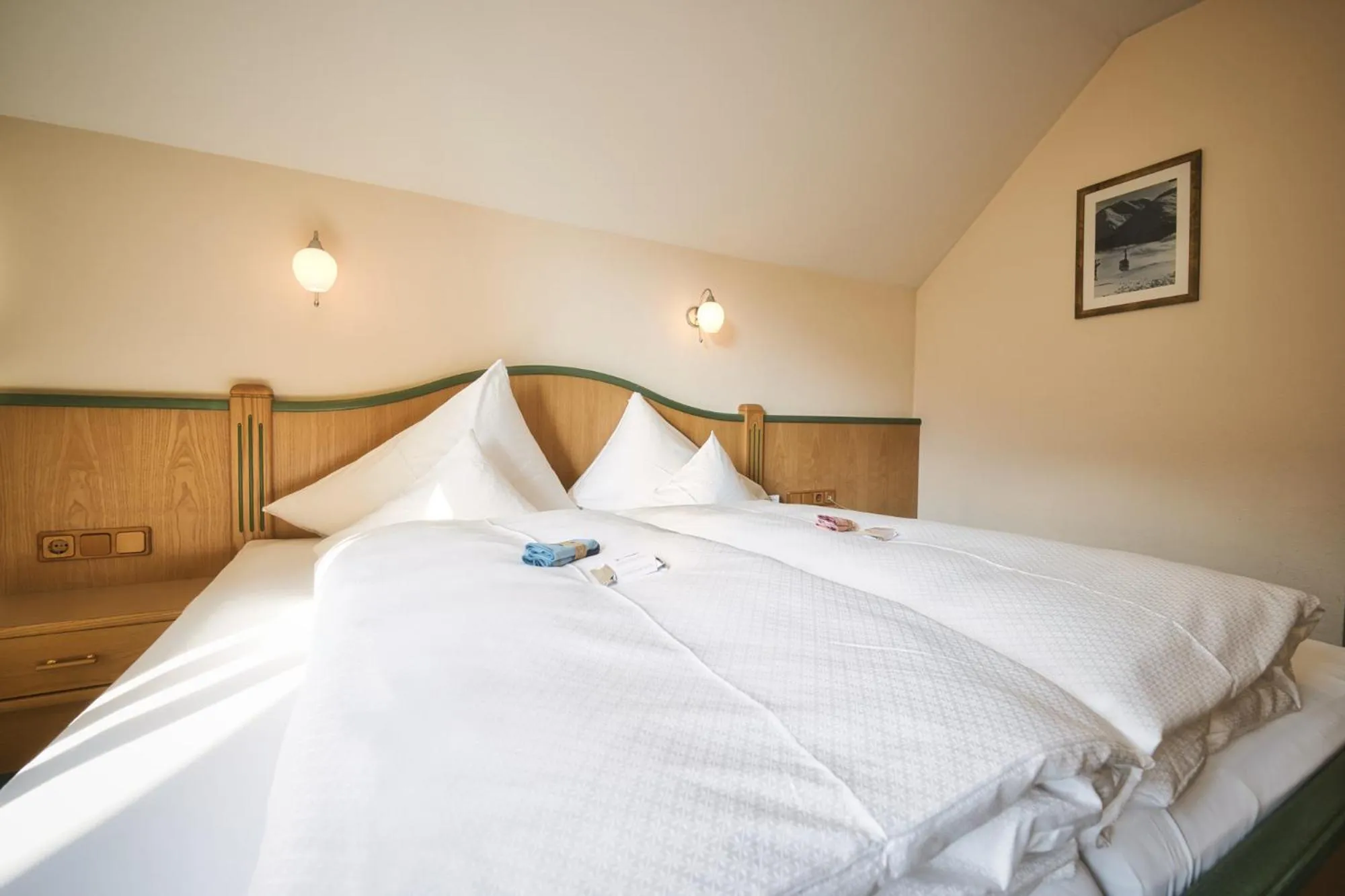 Bed in Hotel Die Arlbergerin - Design & Tiroler Gemütlichkeit