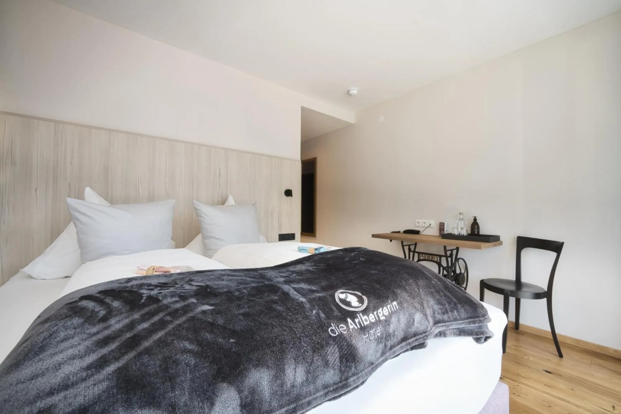 Photo of the whole room, Bed in Hotel Die Arlbergerin - Design & Tiroler Gemütlichkeit