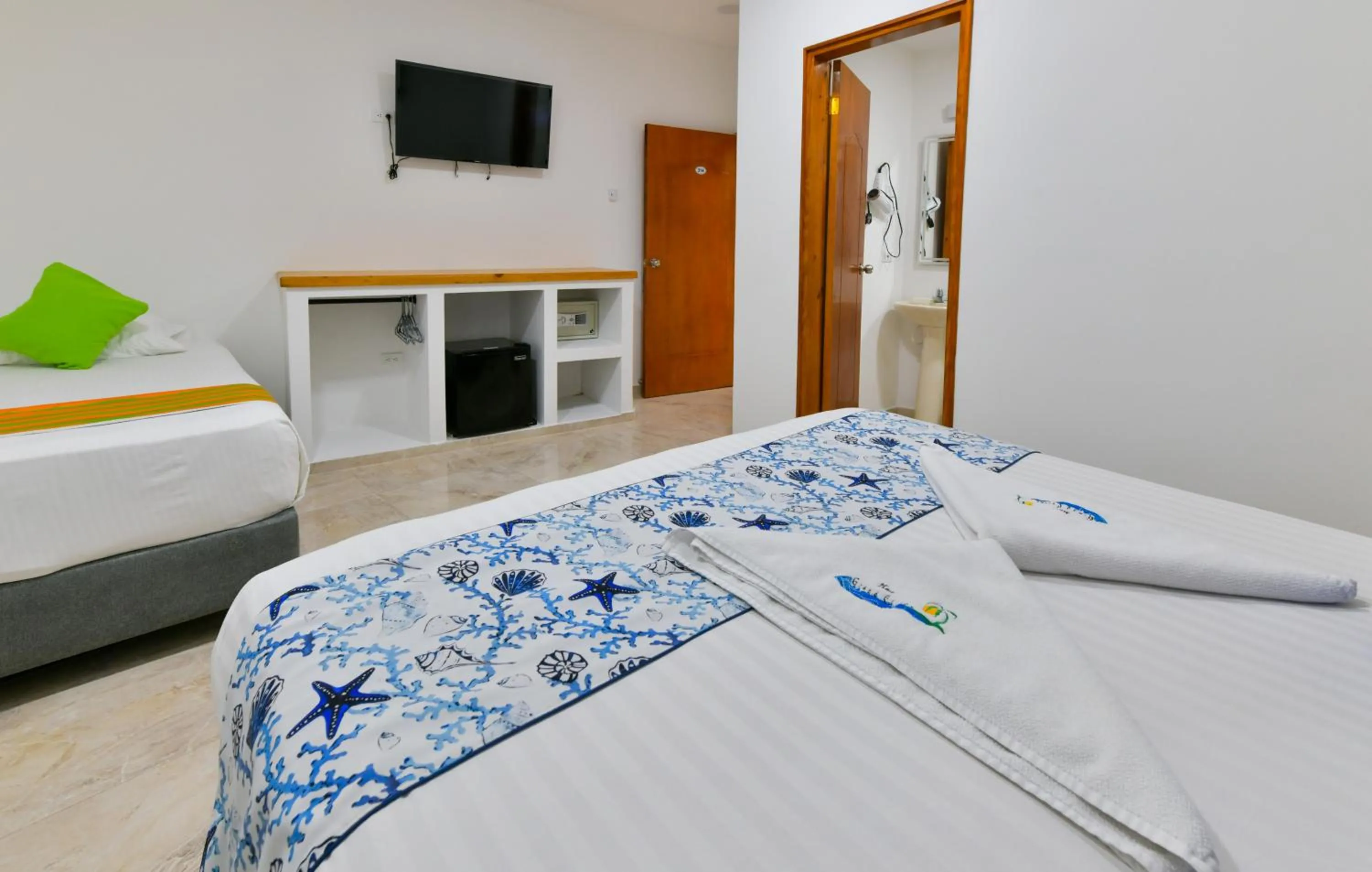 Bed in Hotel Grand Caribe