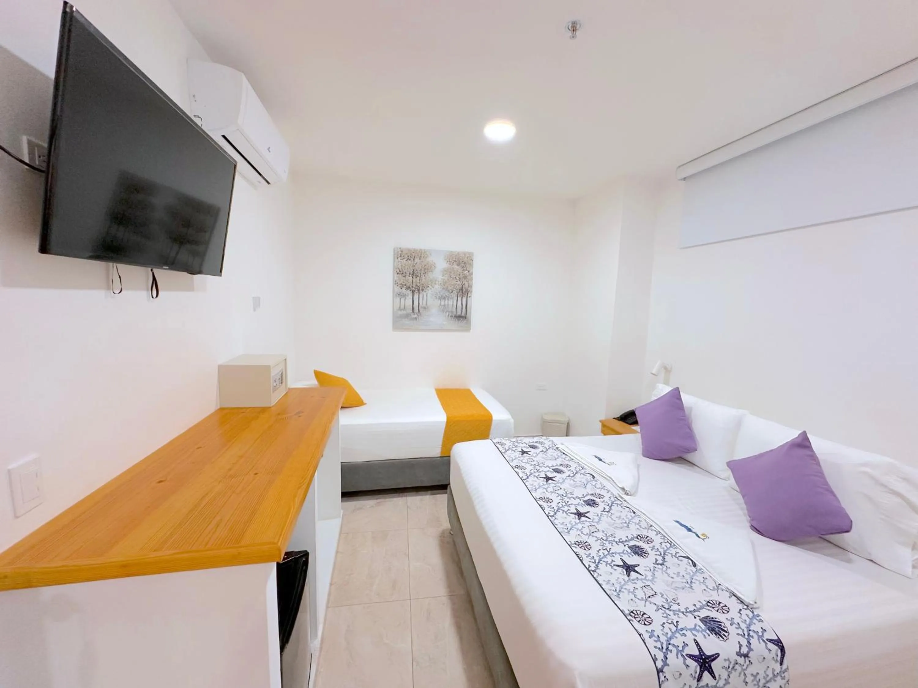 Bed in Hotel Grand Caribe