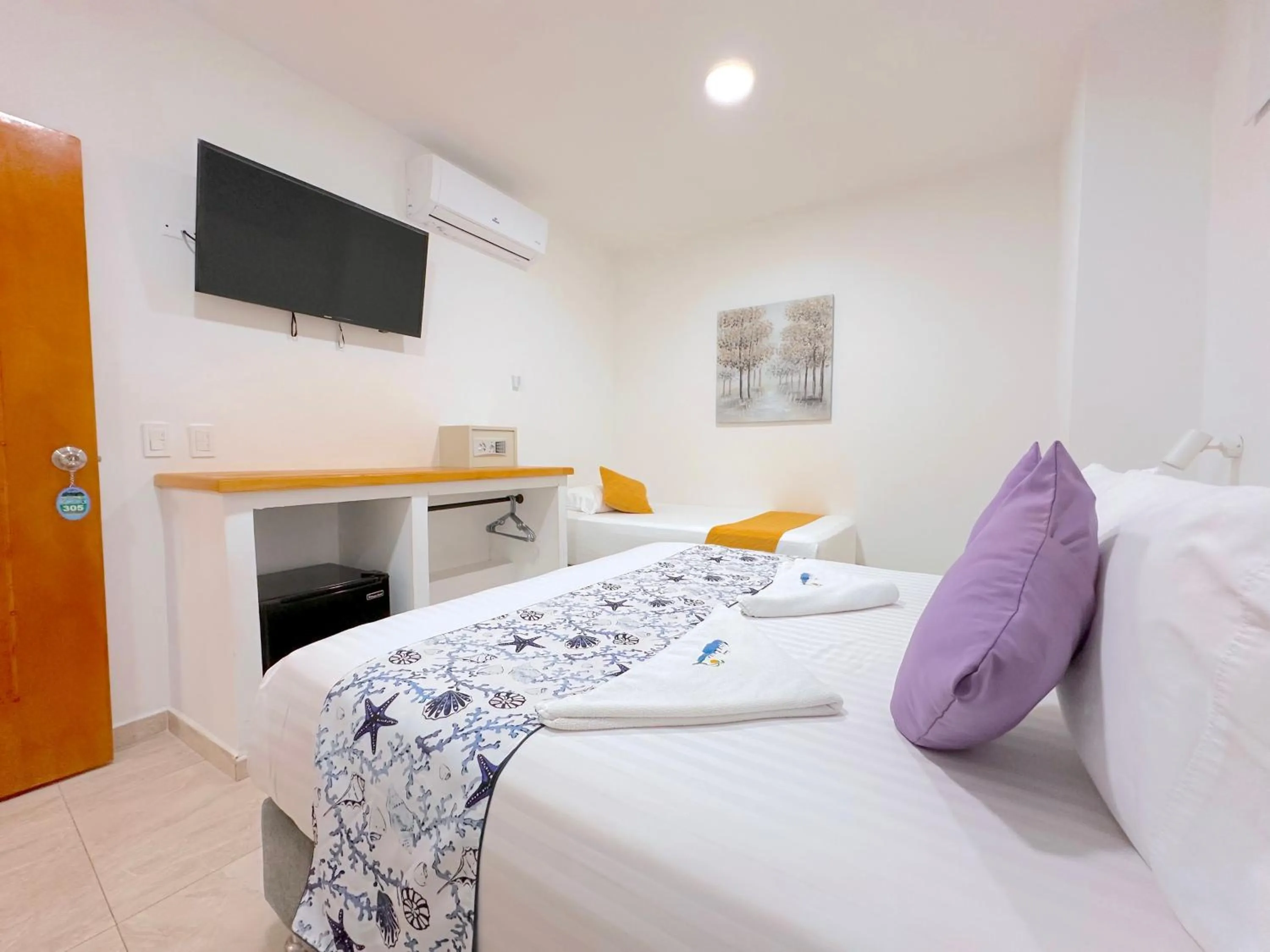 Bed in Hotel Grand Caribe