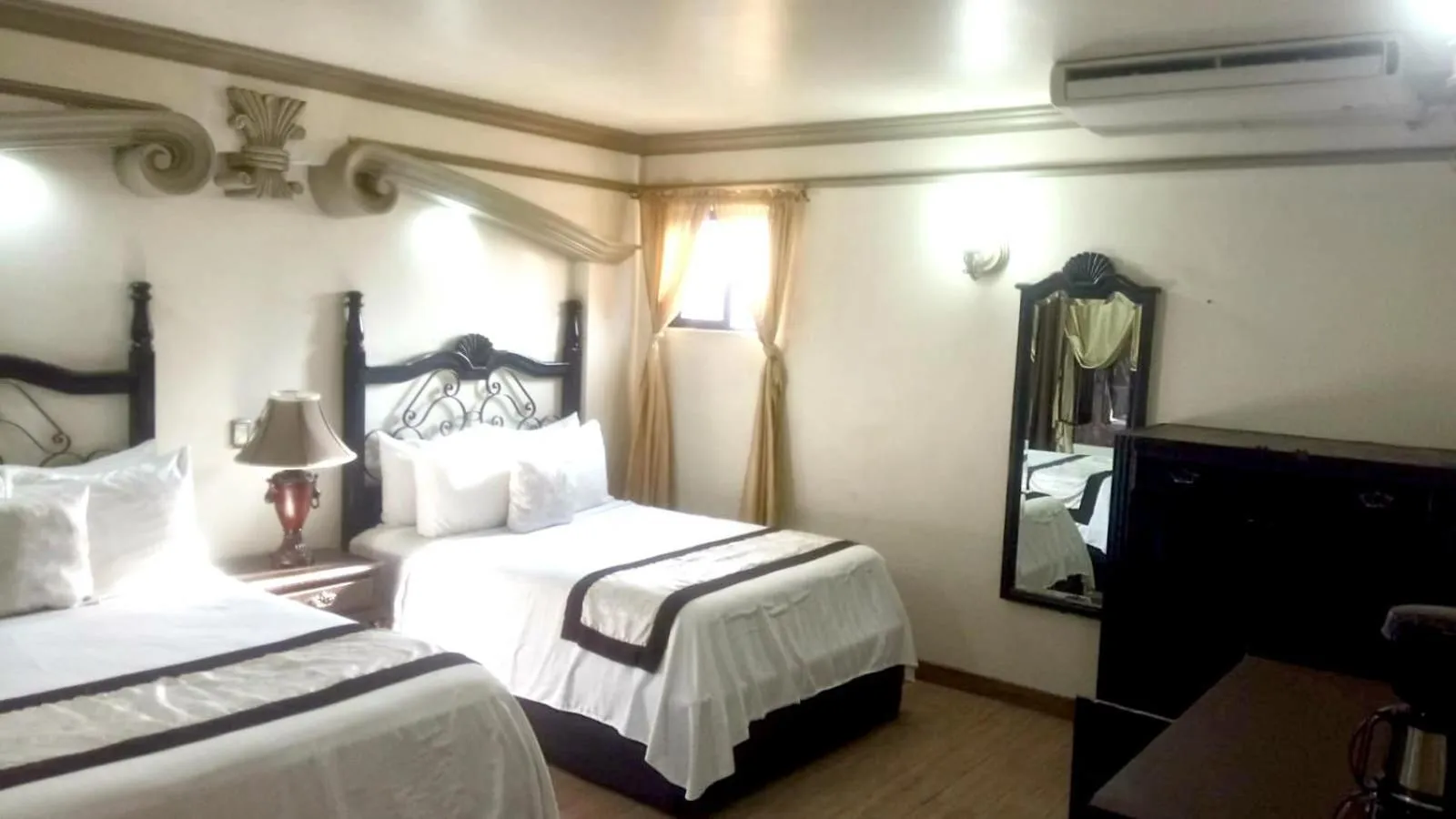 Bed in Hotel Hacienda los Narcisos