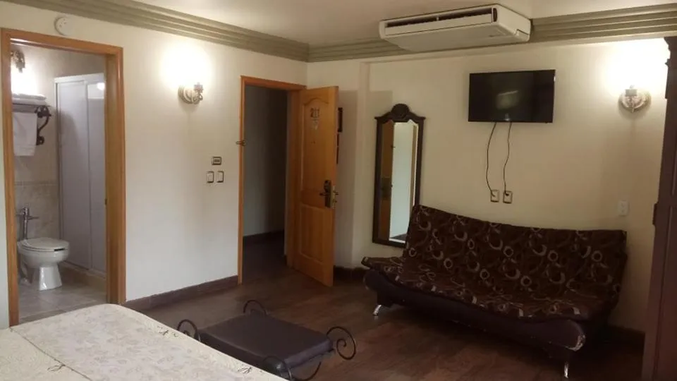 Bed in Hotel Hacienda los Narcisos