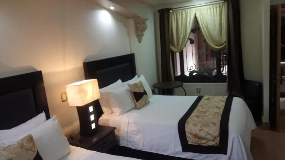 Photo of the whole room, Bed in Hotel Hacienda los Narcisos