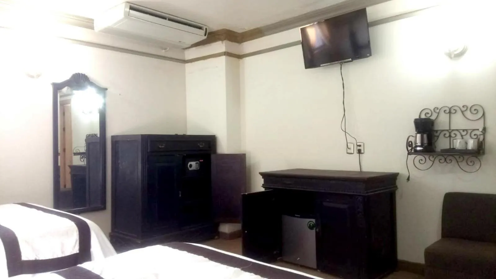 Bed in Hotel Hacienda los Narcisos