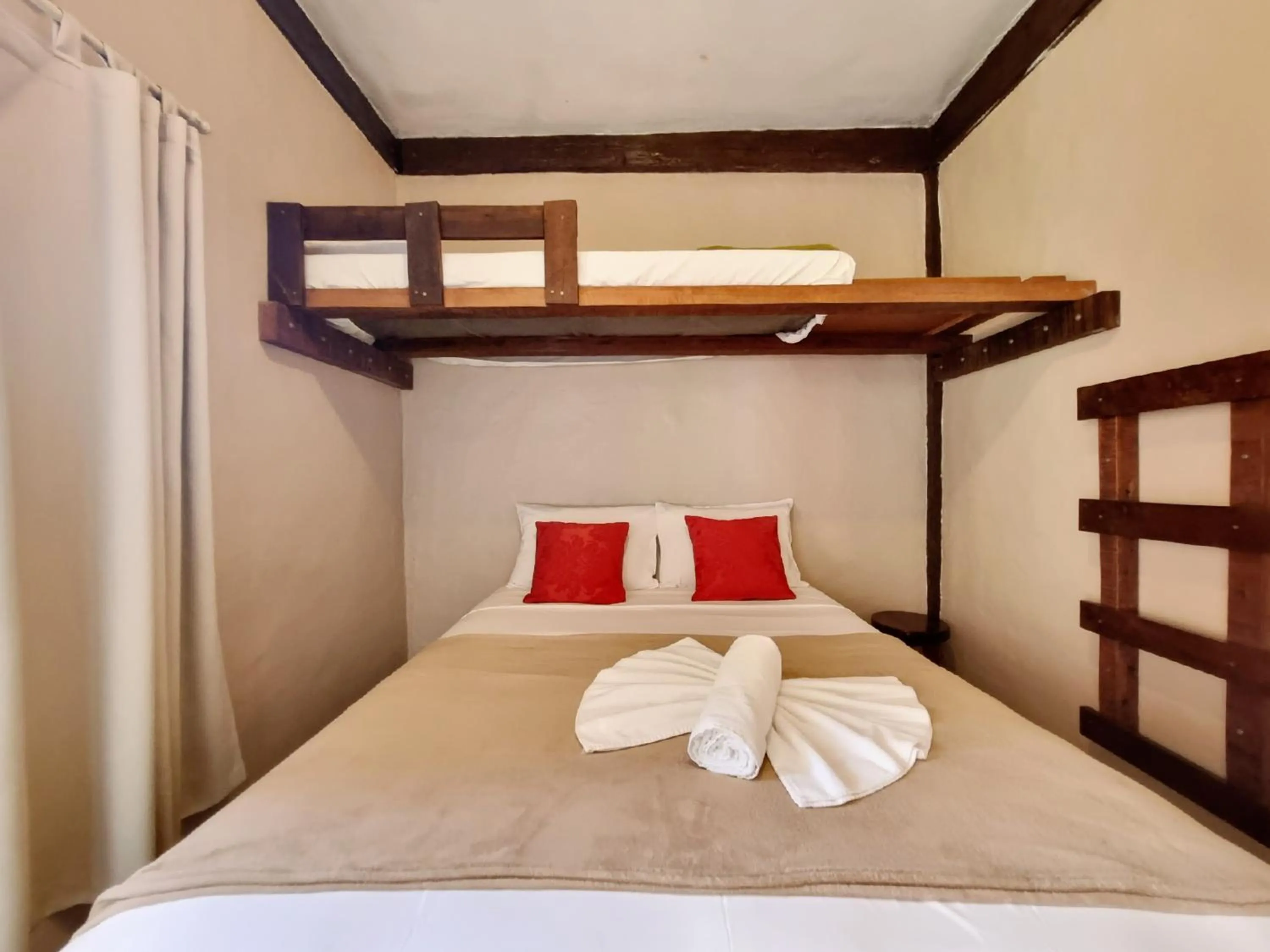 Bed in Pousada Delta Mar Maresias