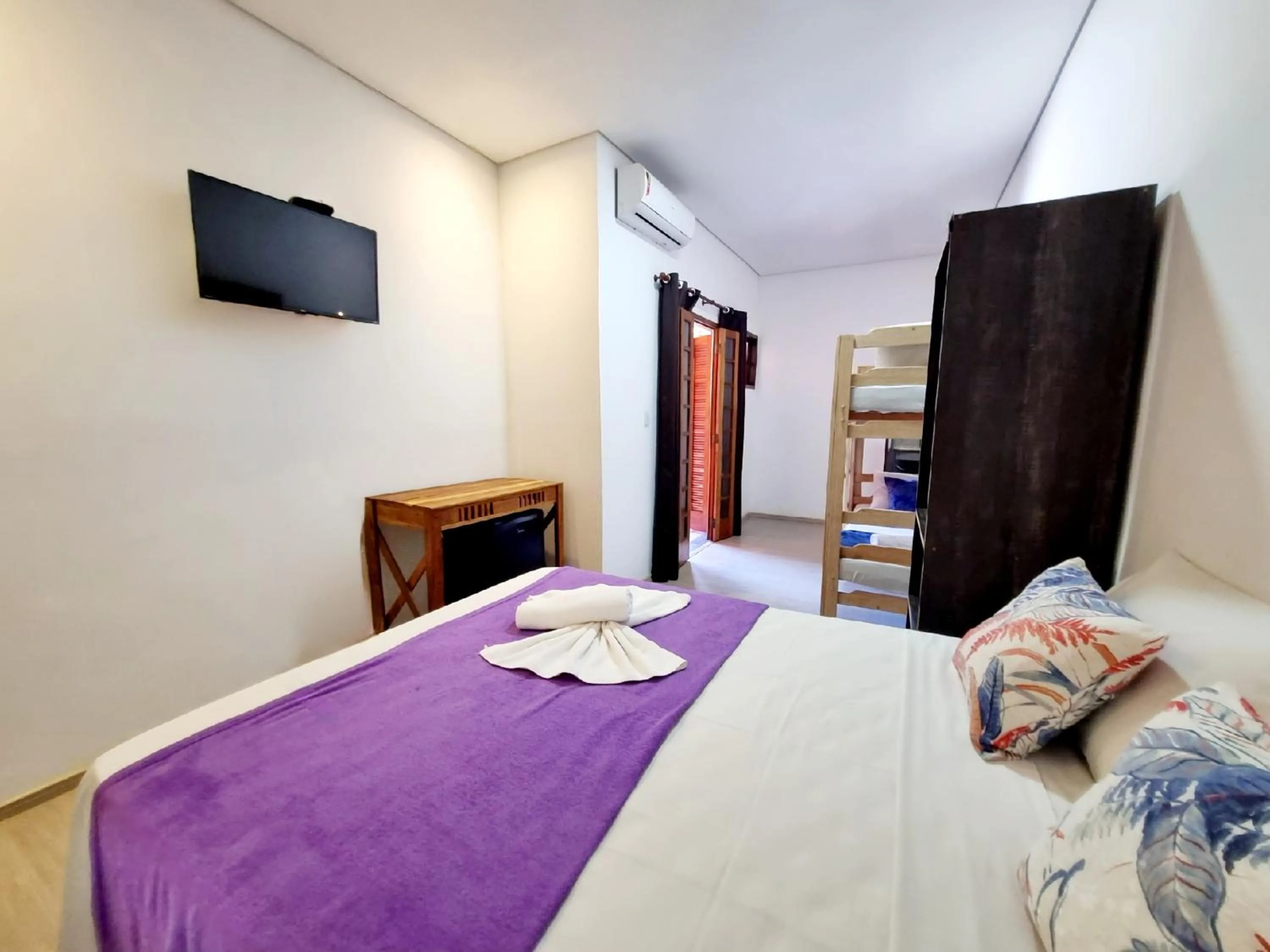 Bed in Pousada Delta Mar Maresias