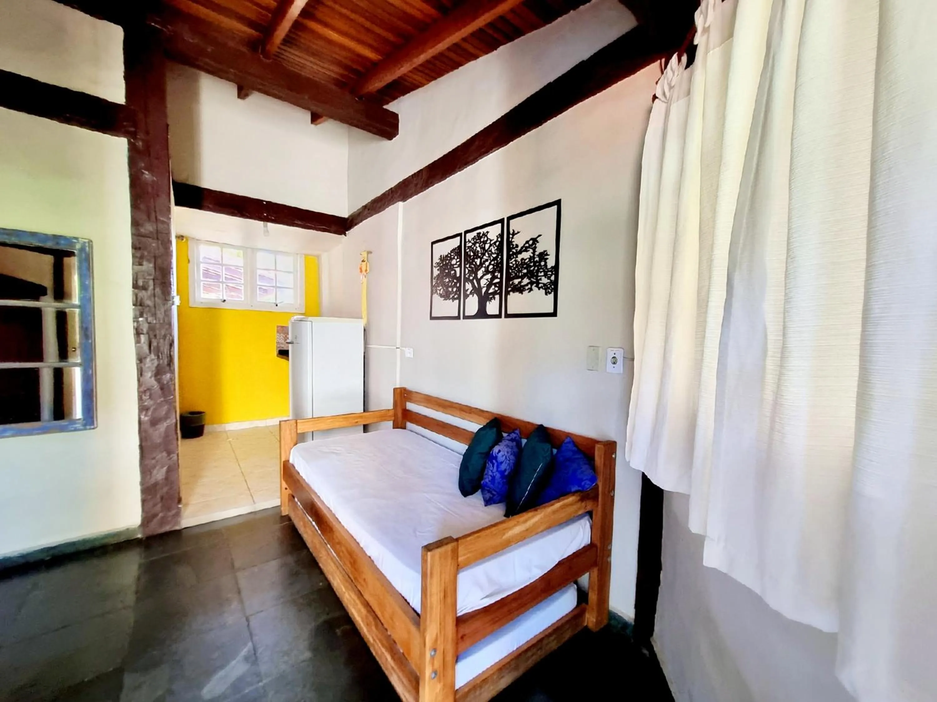 Bed in Pousada Delta Mar Maresias