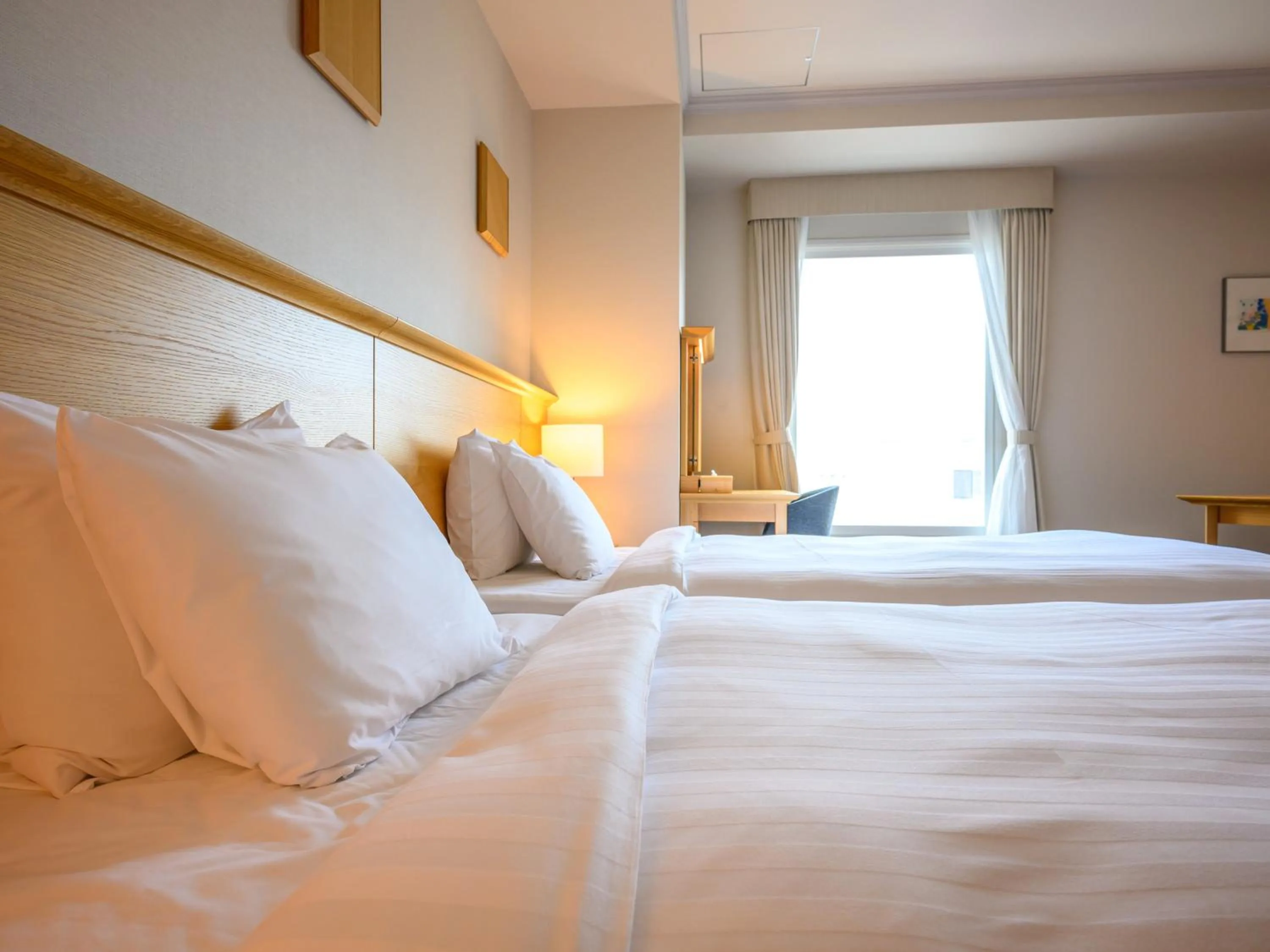 Photo of the whole room, Bed in Authent Hotel Otaru