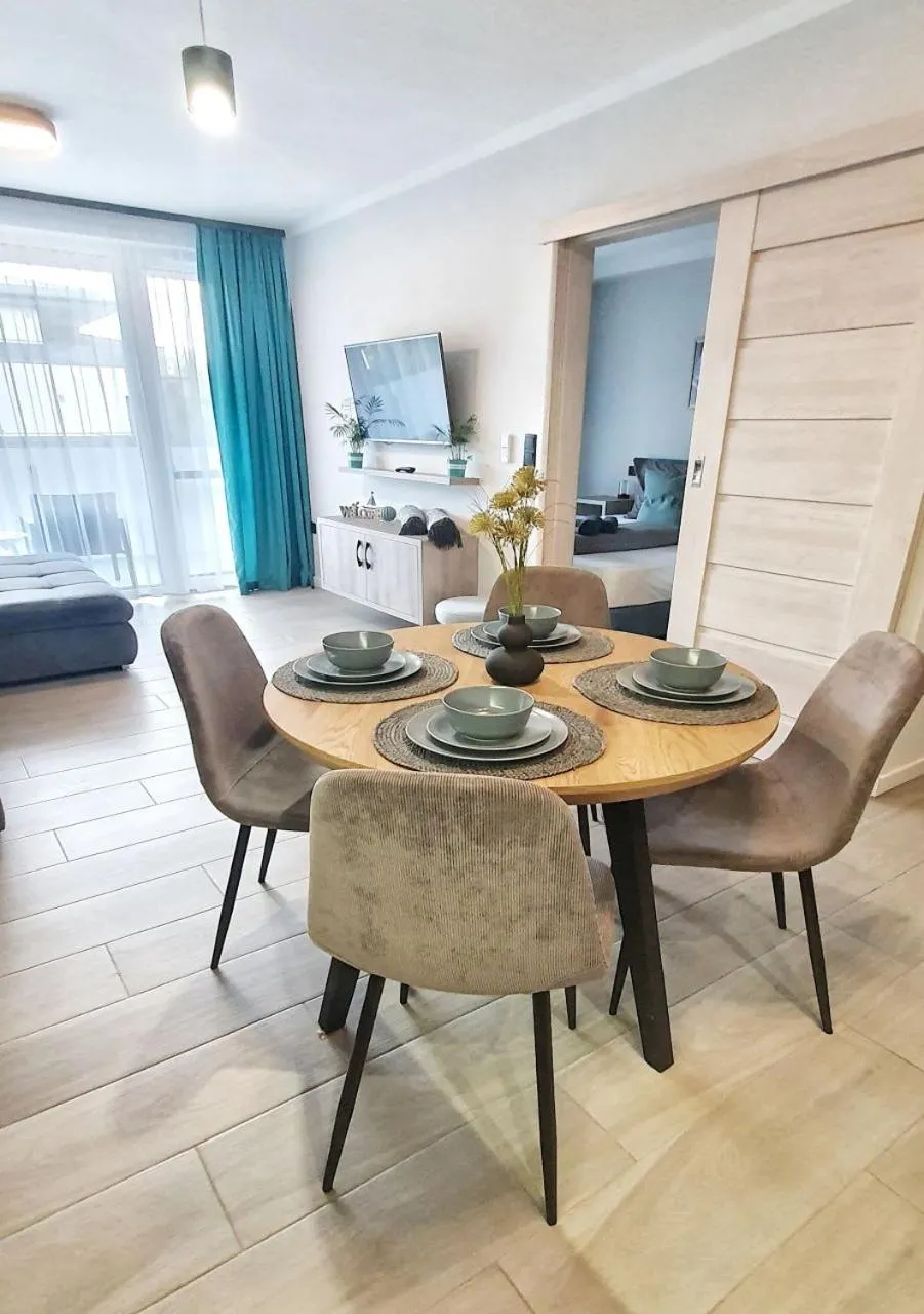 Living room in Marina Apartment by Dora