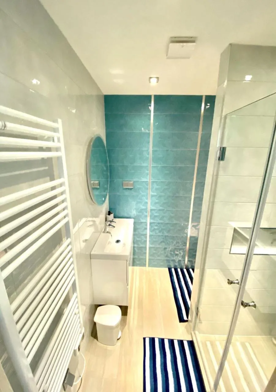 Bathroom in Marina Apartment by Dora