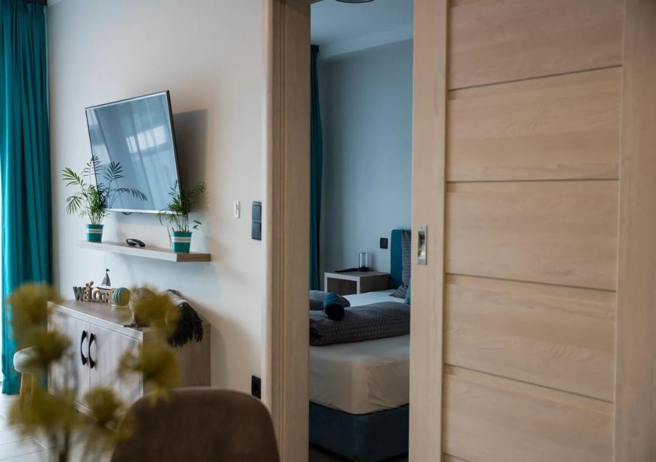 TV and multimedia, Bed in Marina Apartment by Dora