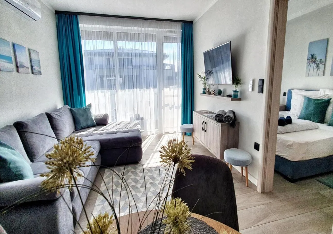 Living room, Bed in Marina Apartment by Dora