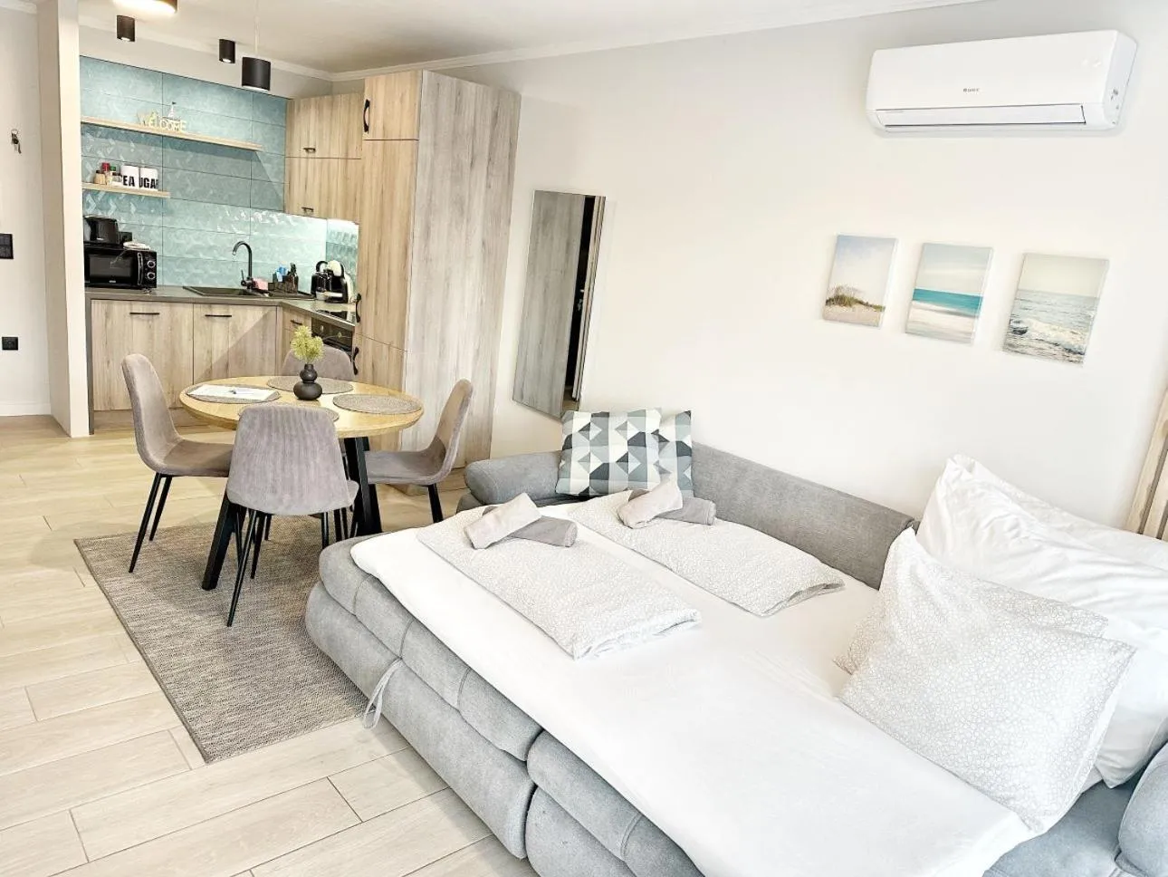 Living room, Bed in Marina Apartment by Dora