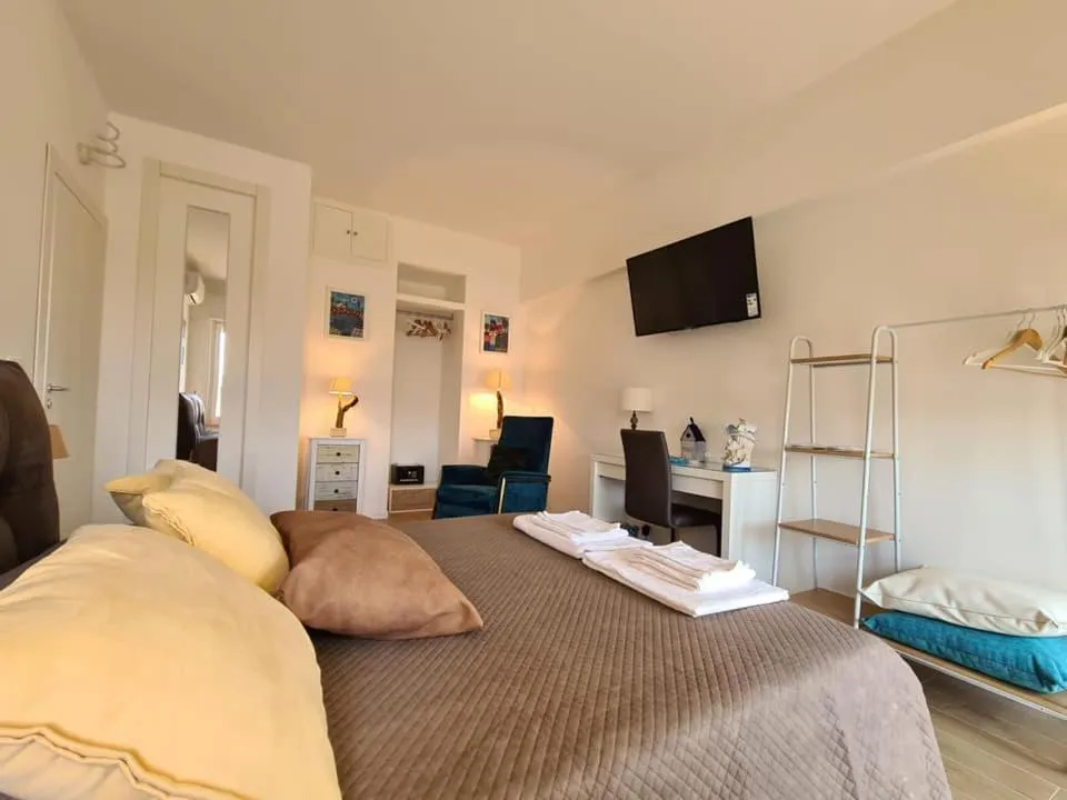 Bed in Le Dimore del Gufo B&B and Apartments Suite