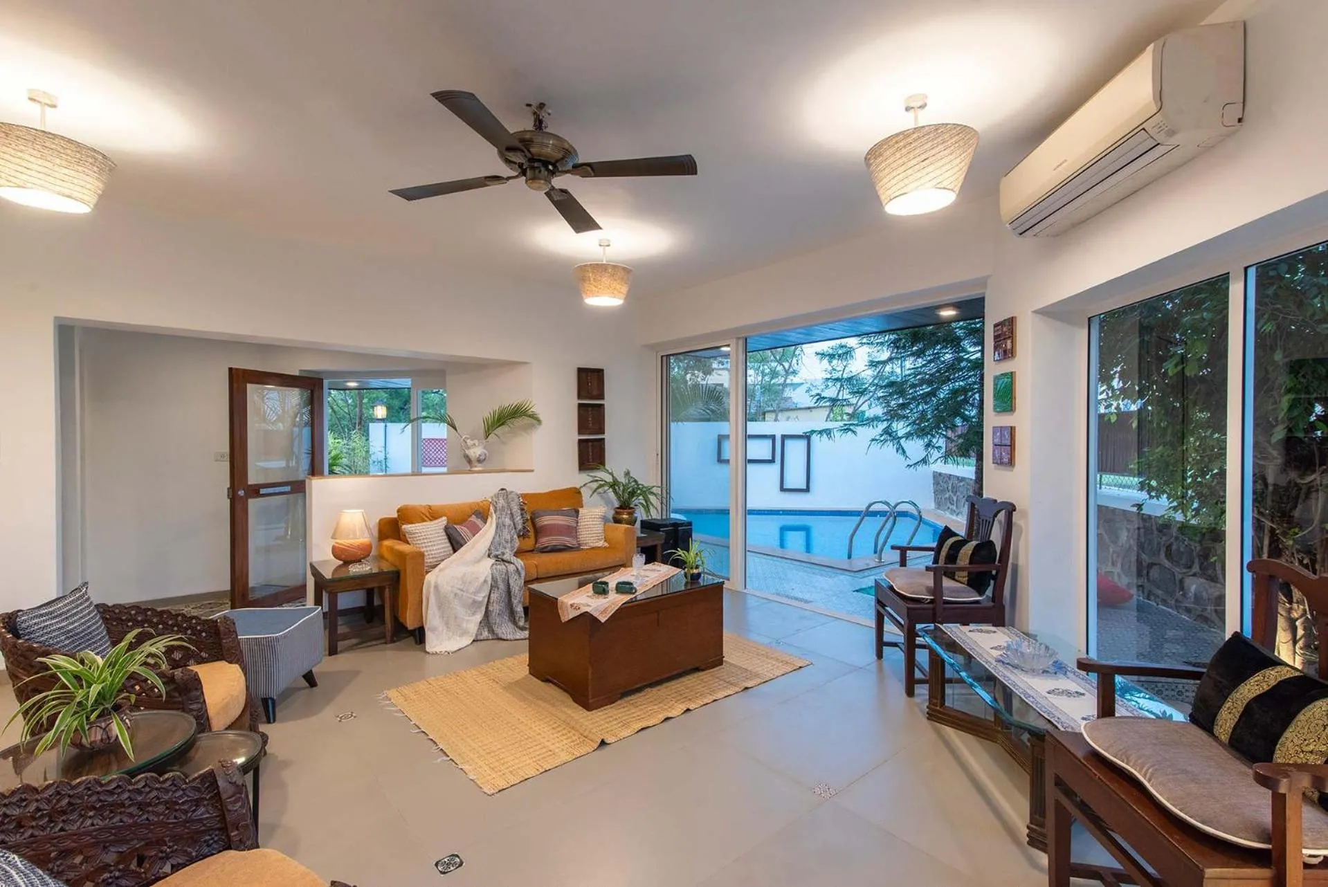 Living room in El Cottage by StayVista - An enchanting escape with Scenic views, Colonial decor & Private plunge pool